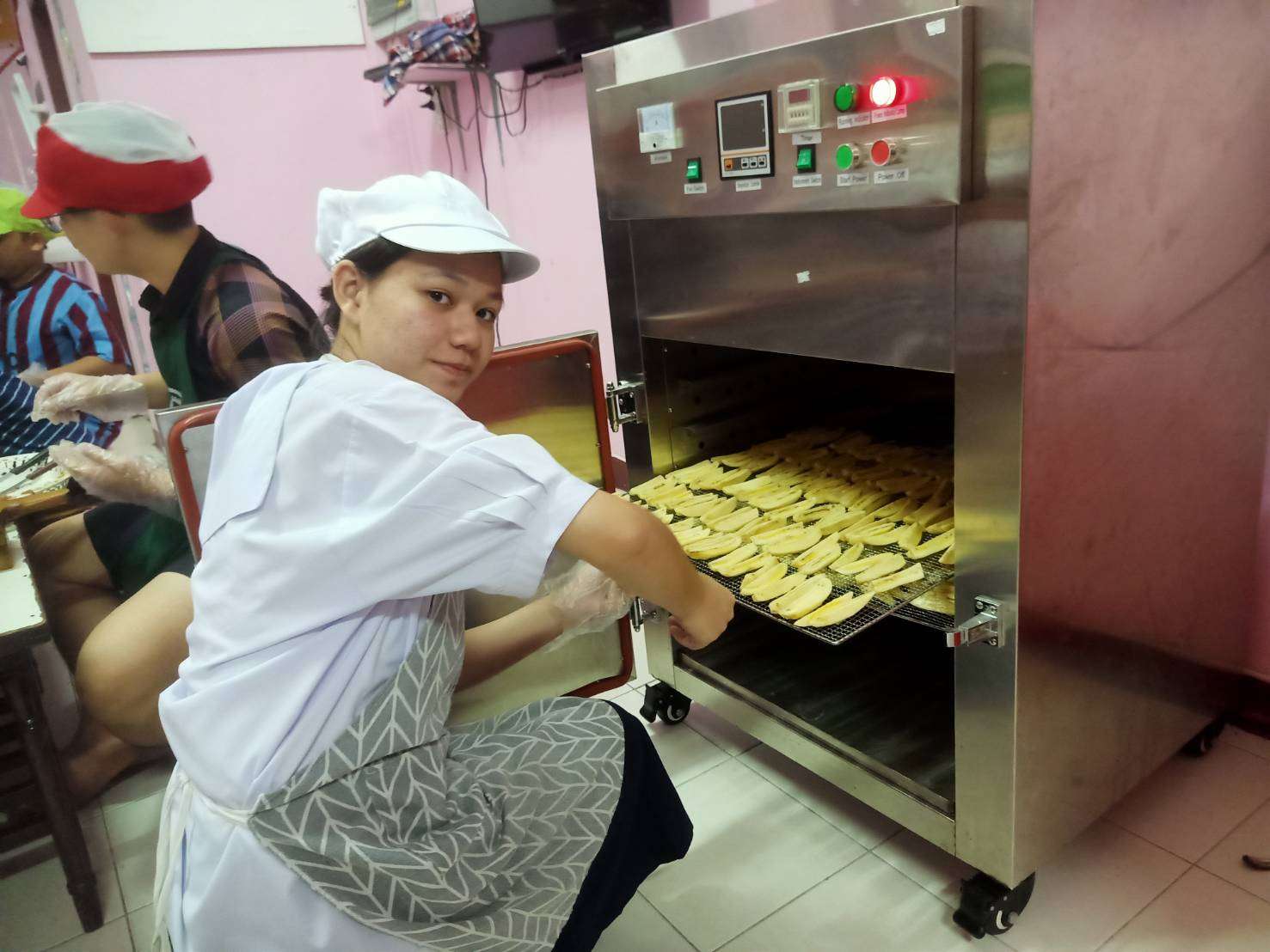 Place the prepared, sliced bananas into the convection oven.