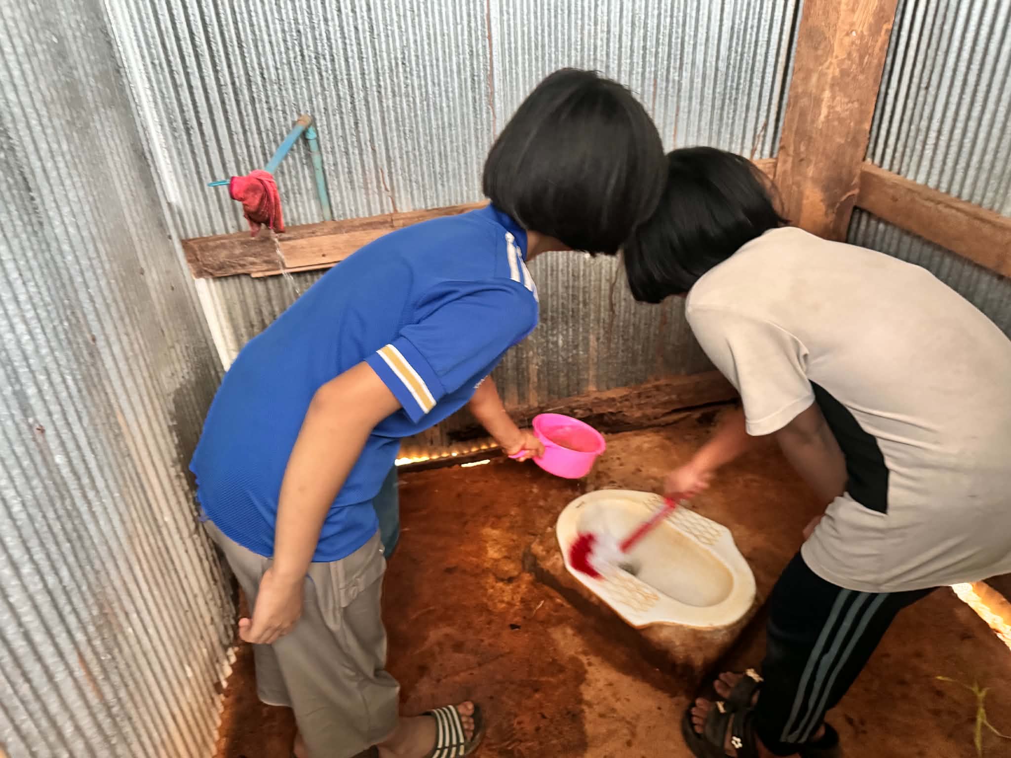 The child is cleaning.