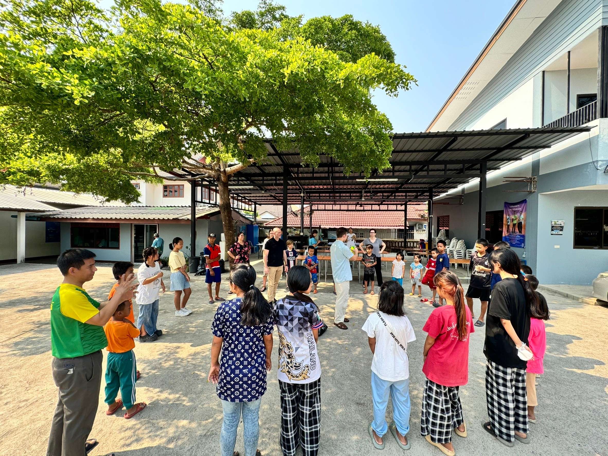 Children are happy when they play together as a team.