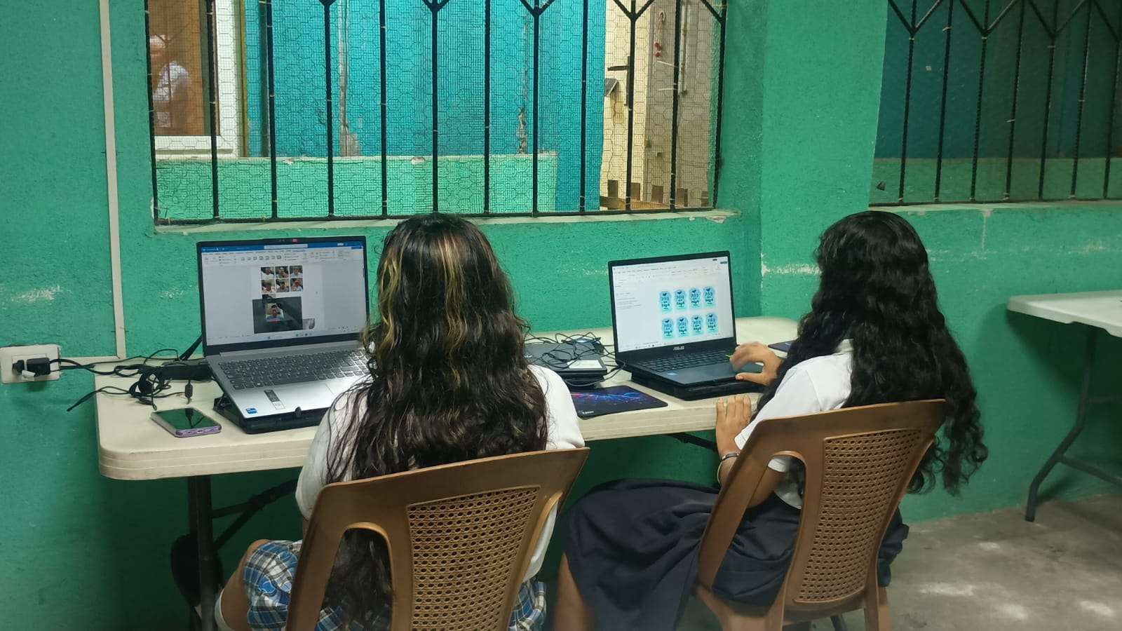 Participants working on keychain designs