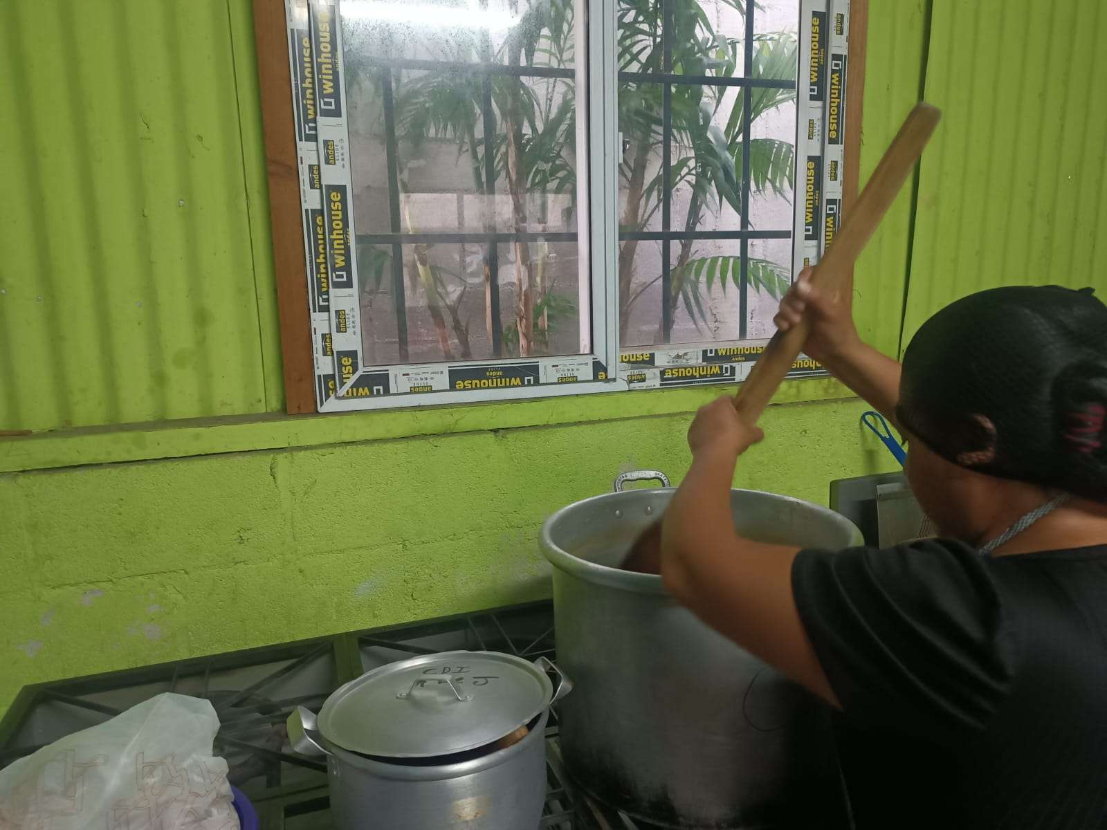 Volunteer preparing food
