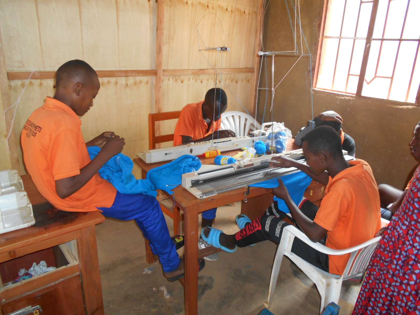 children are learning to sew sweater for  winter 