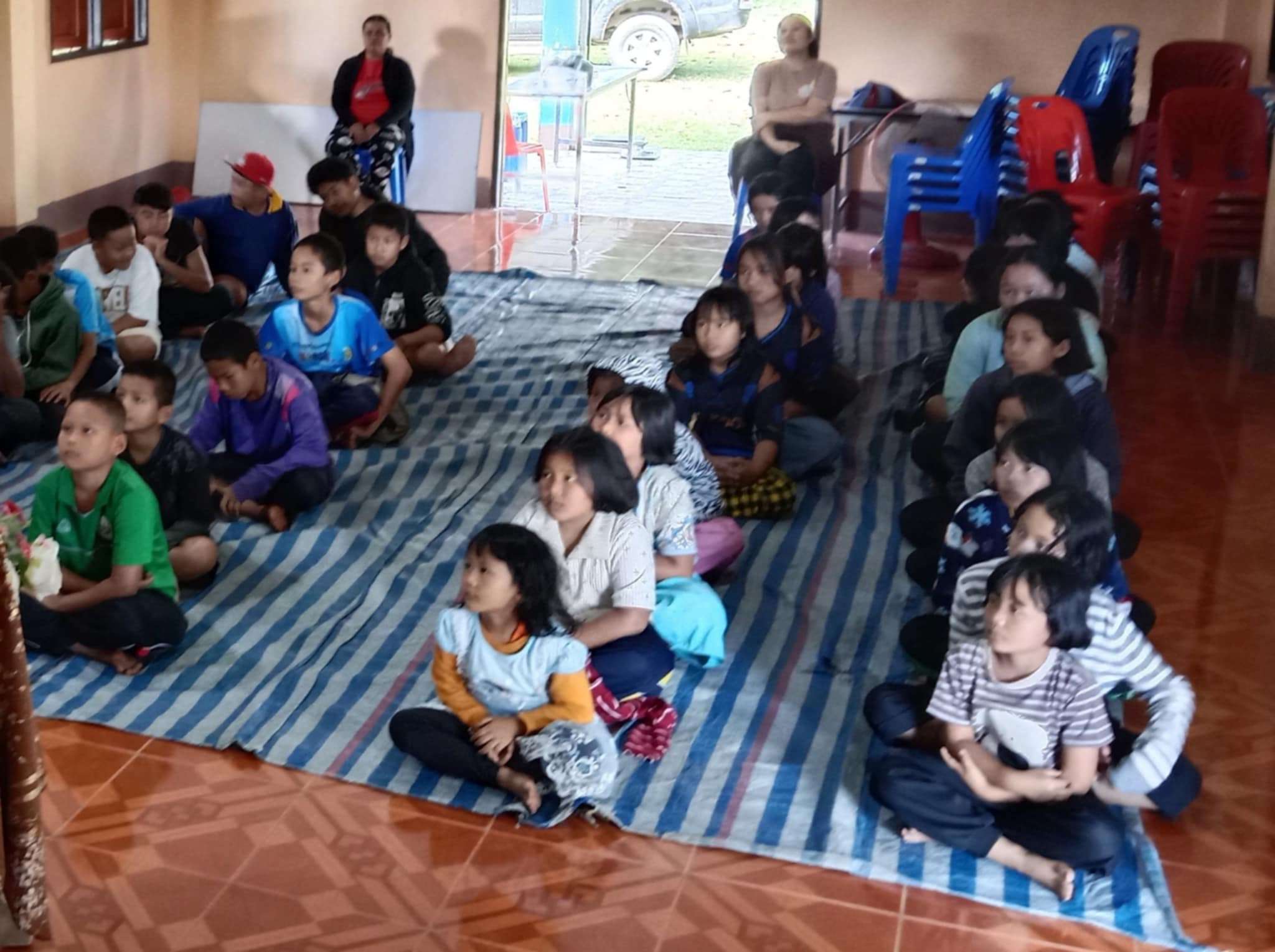 Engaged and excited! 🎉 Kids in the community love joining activities and listening intently!