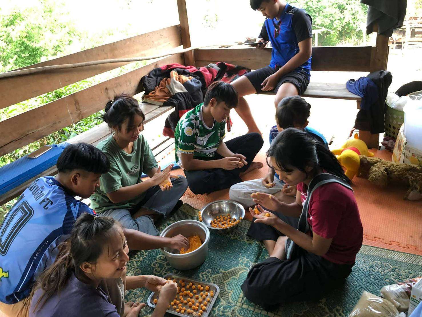Young people bring pumpkins to process into snacks for sale, but lack the equipment at home