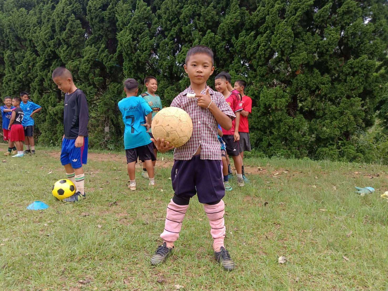 The children are learning the basics of sports.