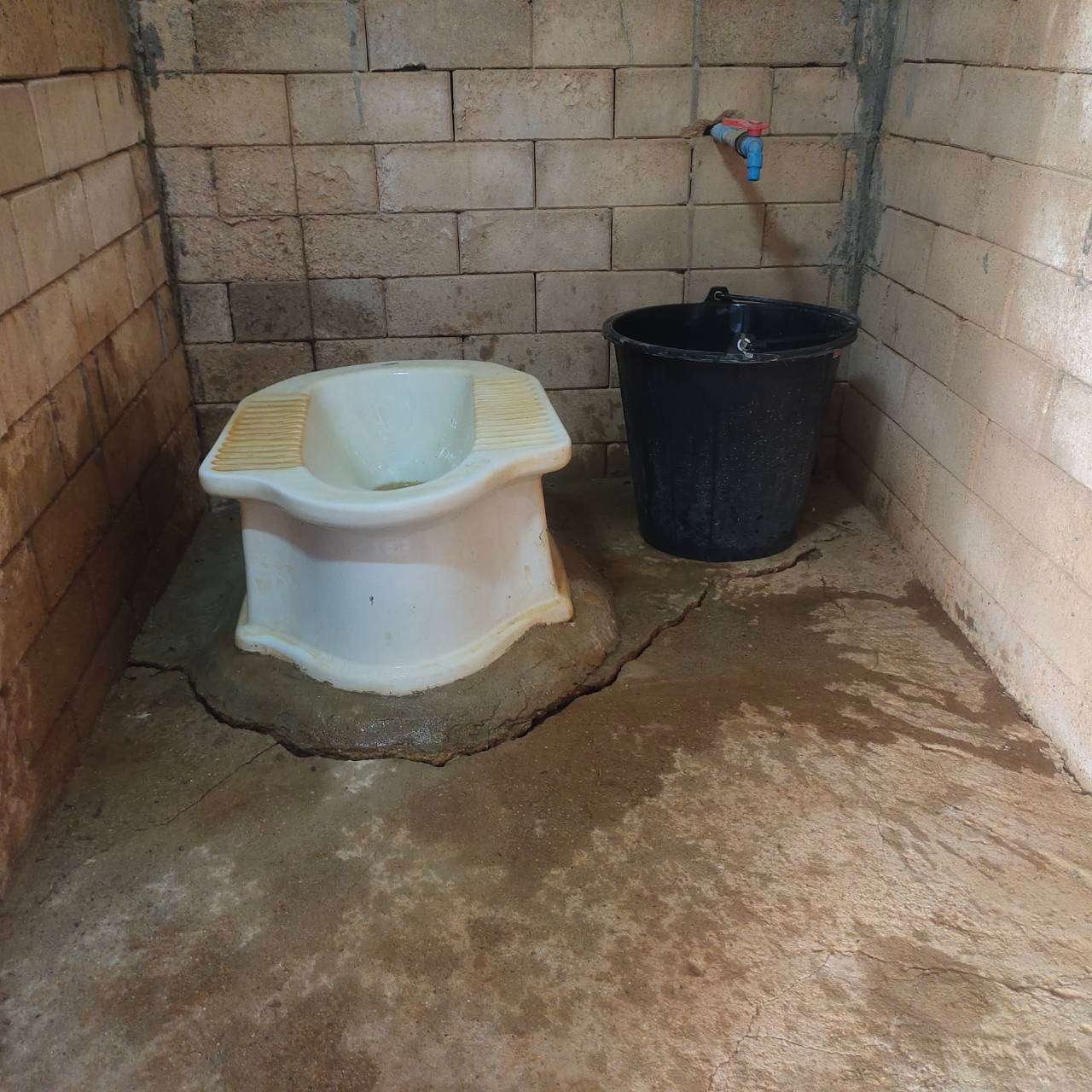 Due to prolonged use and lack of proper maintenance, the restroom facilities have become worn, with visible stains and structural cracks that compromise cleanliness and safety.