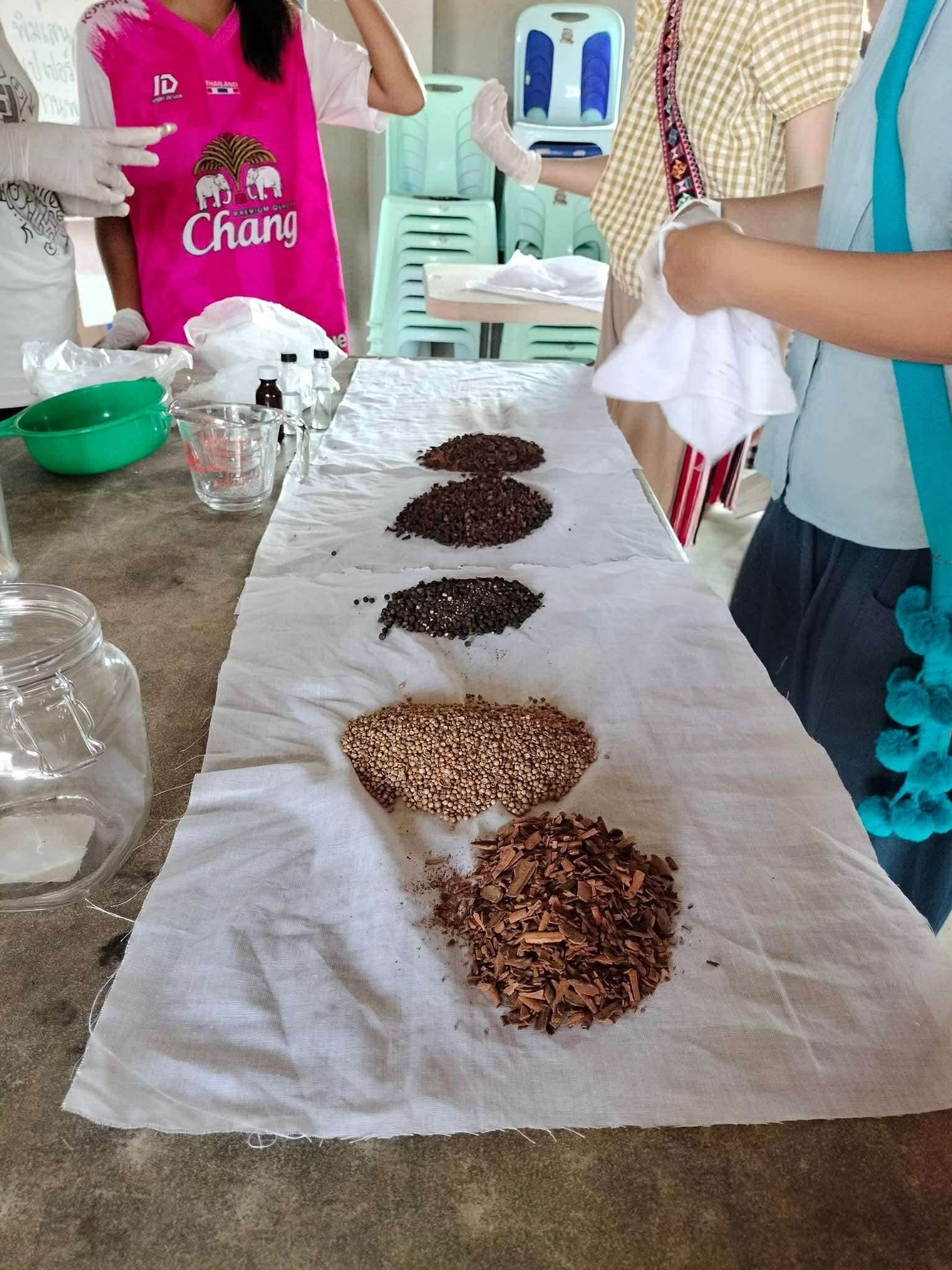 Herbal Transformation: Roasting the herbs to unlock their flavors, then letting them cool for the next step in the process.
