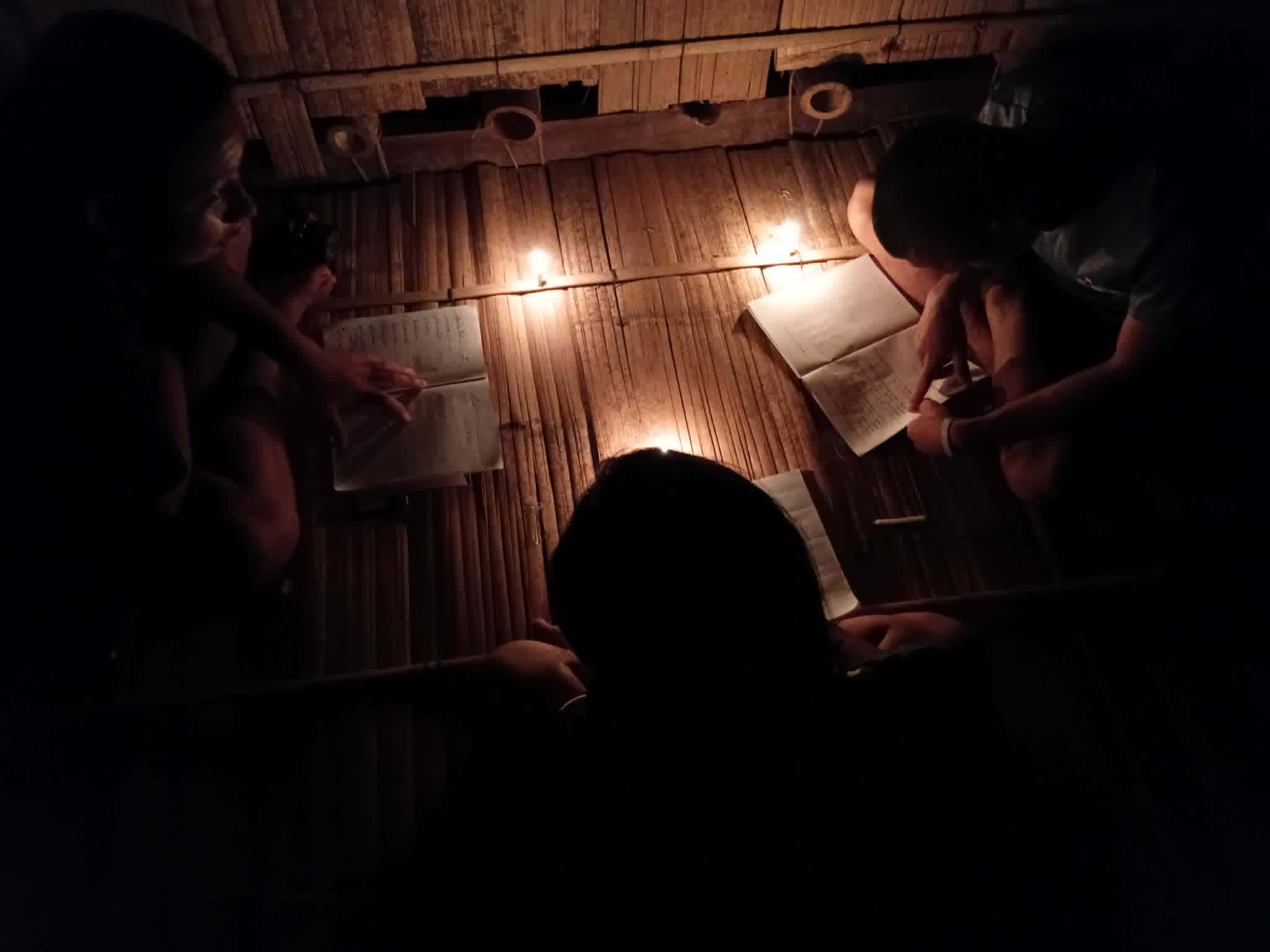 Reading by candlelight