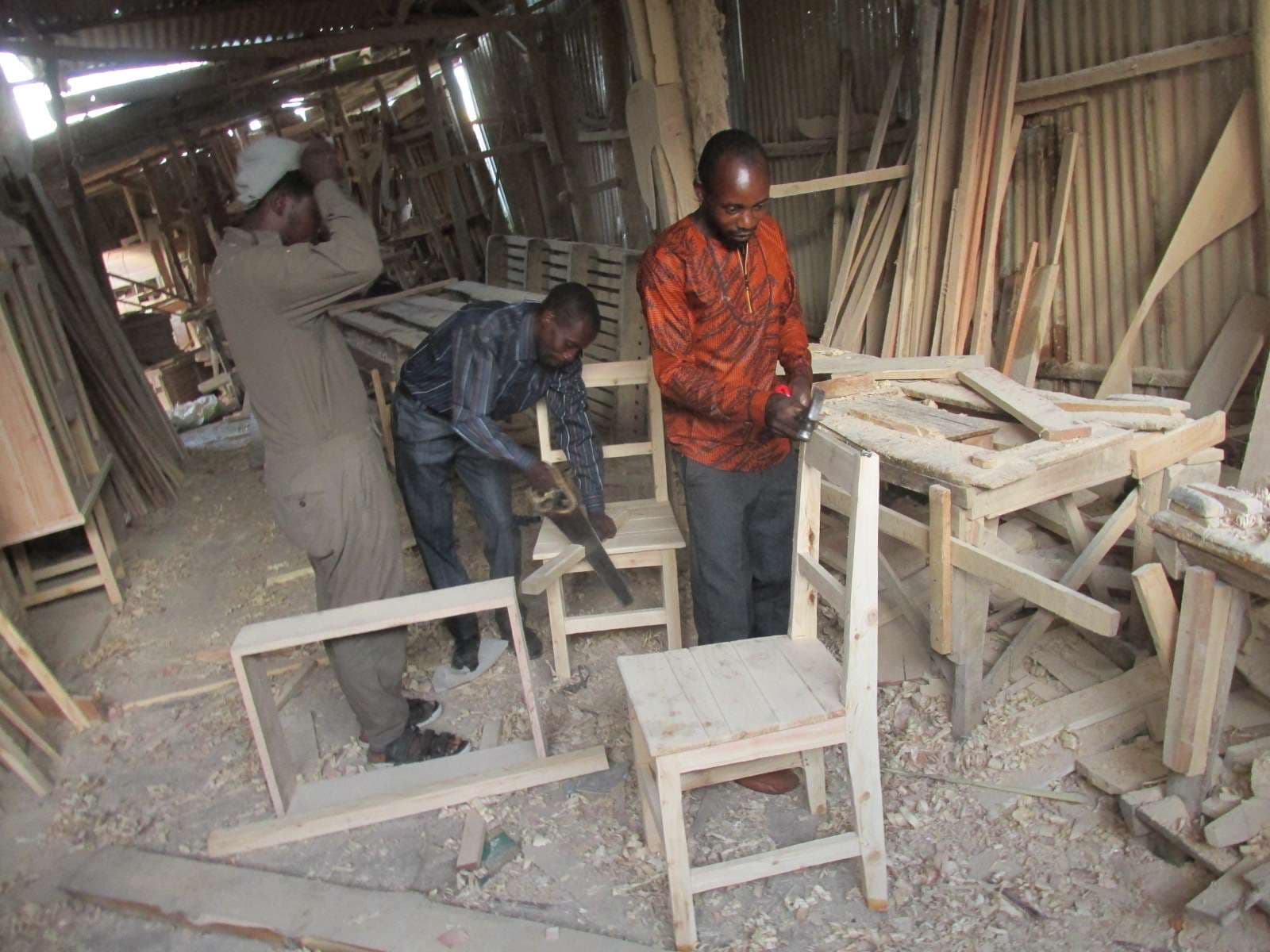 Carpenters at work in another carpentry workshop