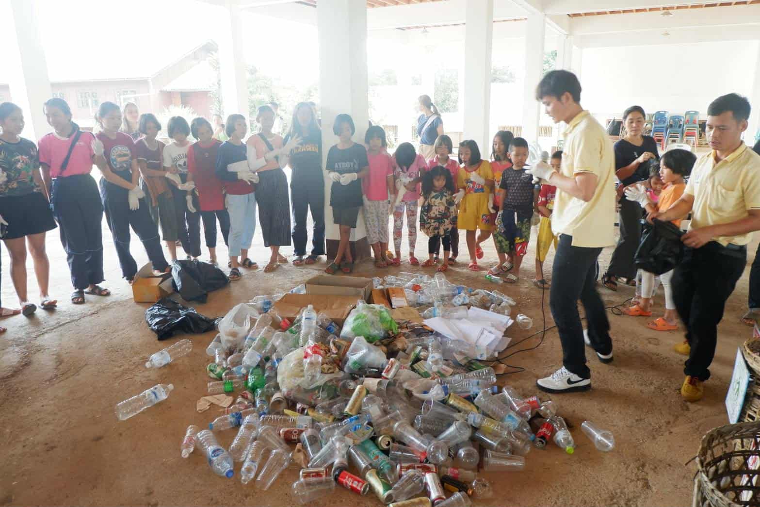 Children learn the process of separating different types of waste.