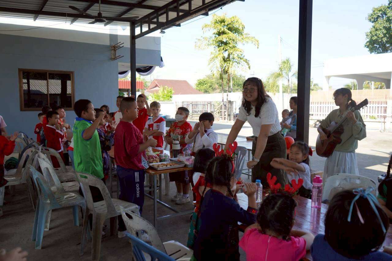 Teacher Rawee uses space in the church to promote children's play.