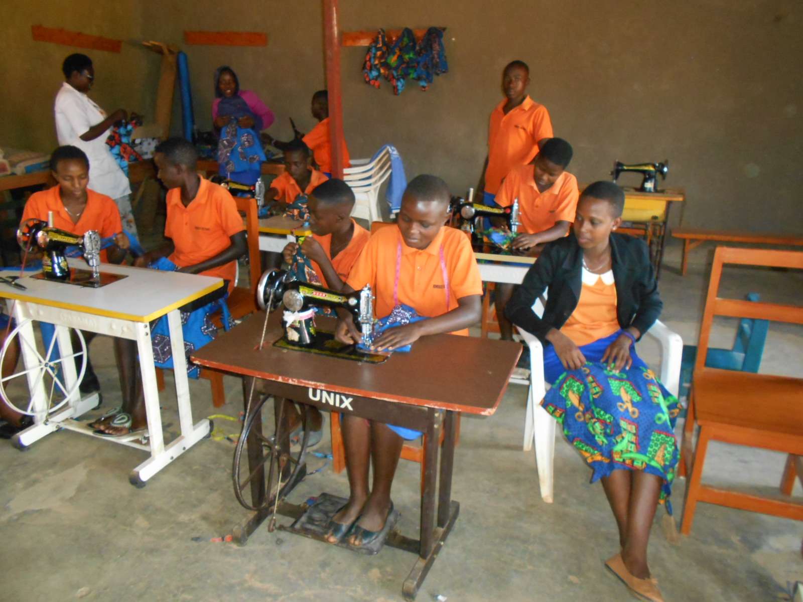 participants are learning to sew shirts and skirts