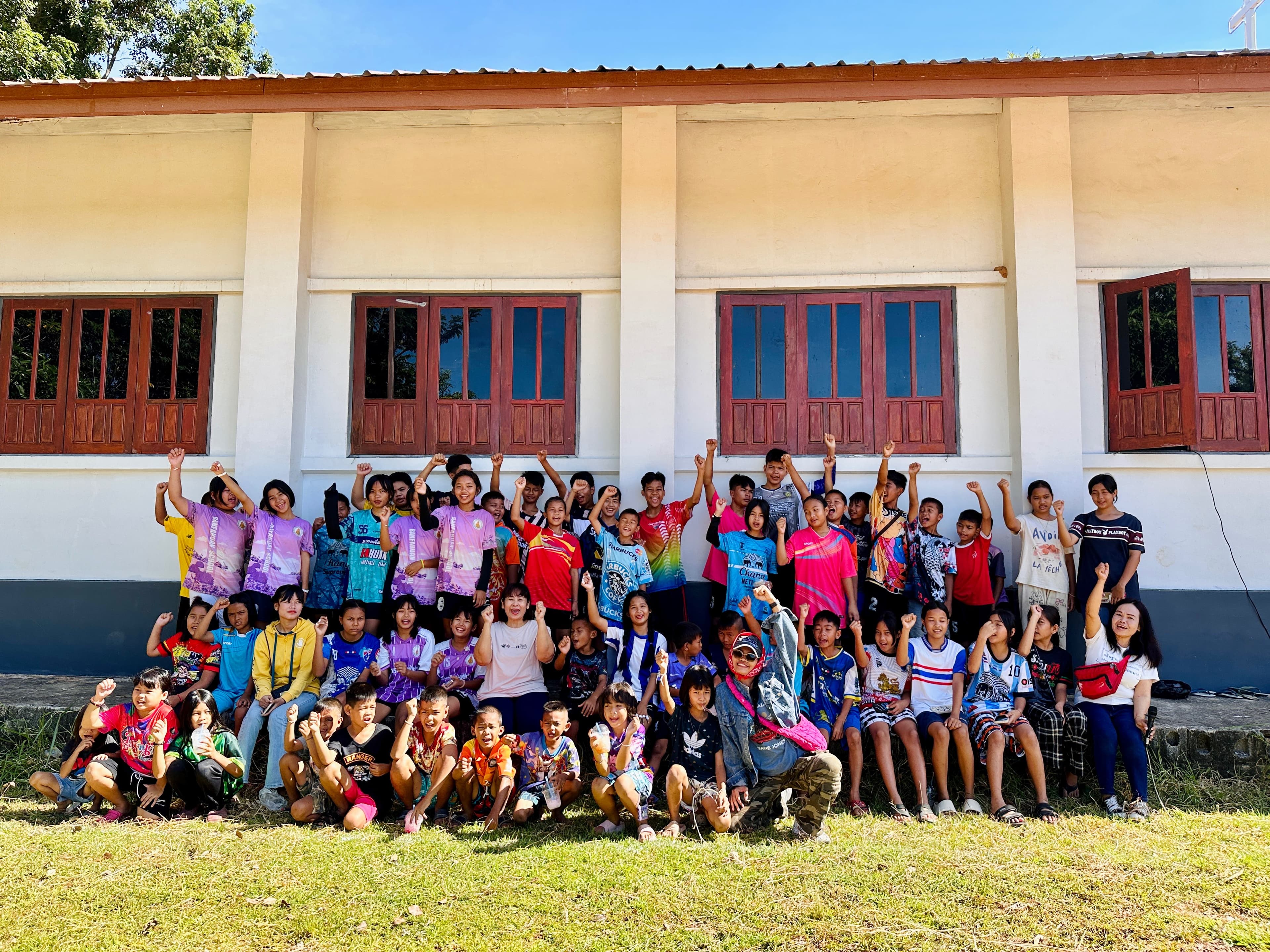 Group photo after the football match.