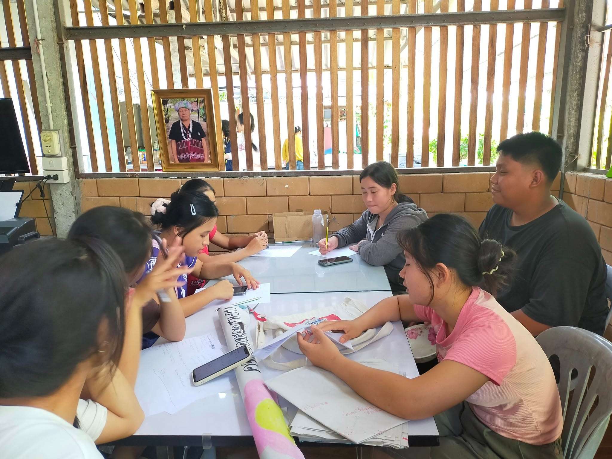 Youth leaders engaging in a collaborative planning meeting for upcoming initiative