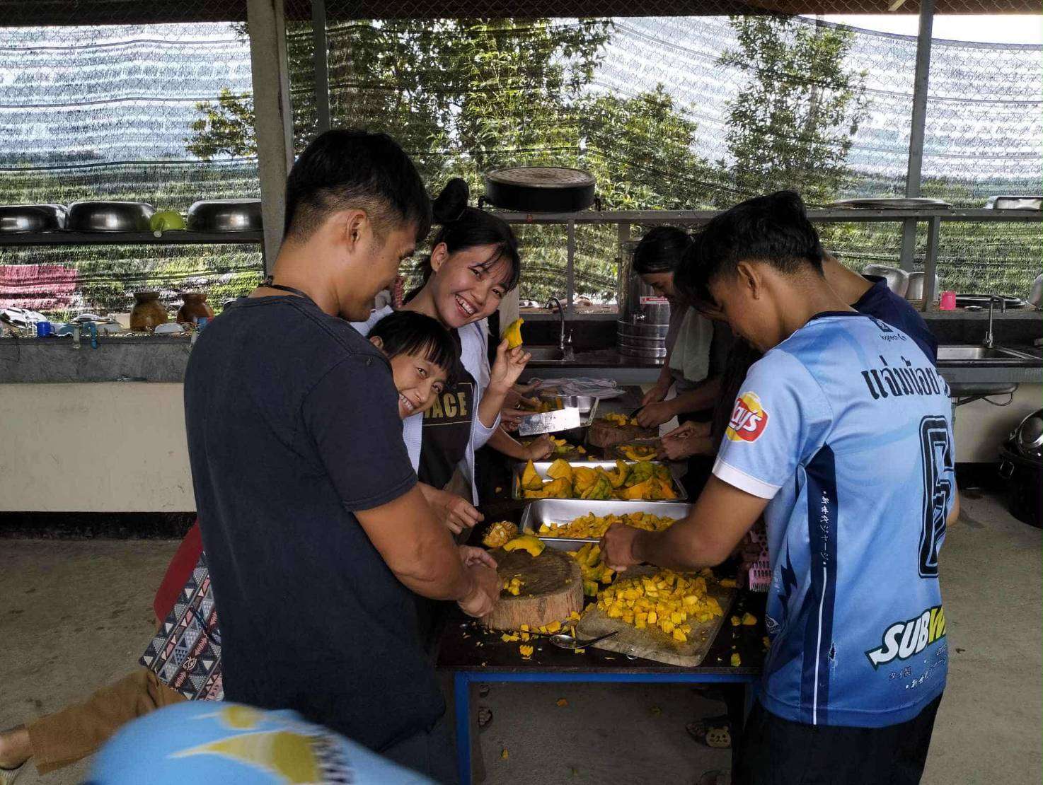 Preparing pumpkins for processing.