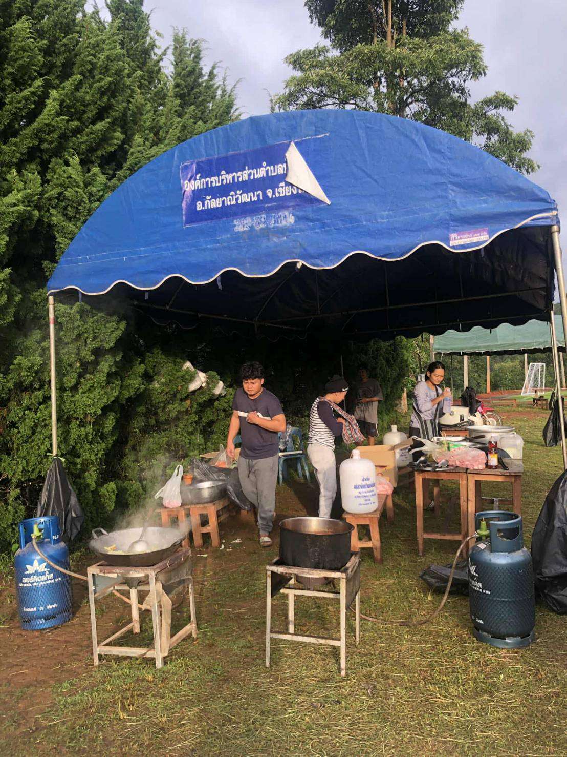 Families earning money by selling food and snacks.