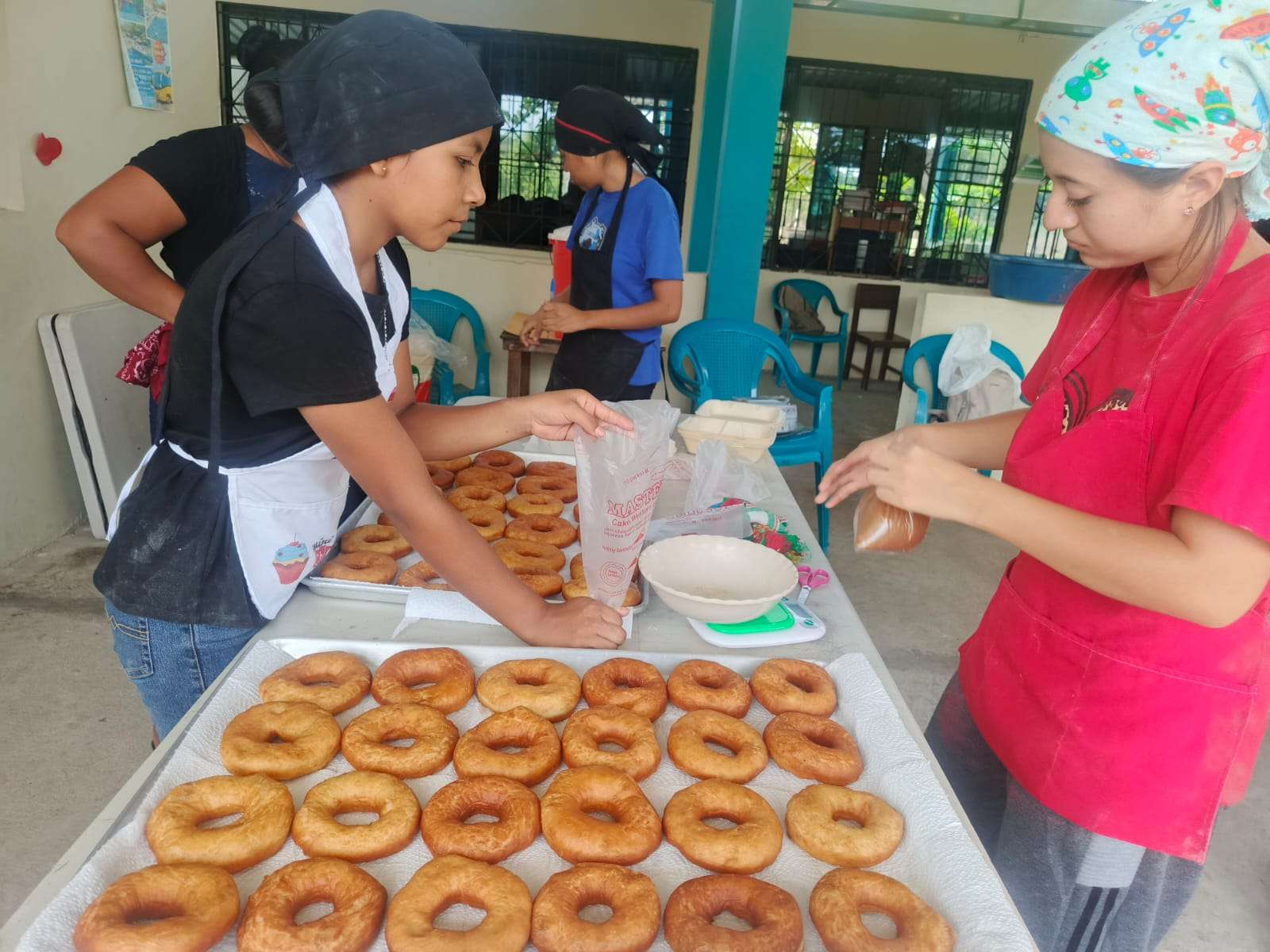 Participants making donuts in the workshop
