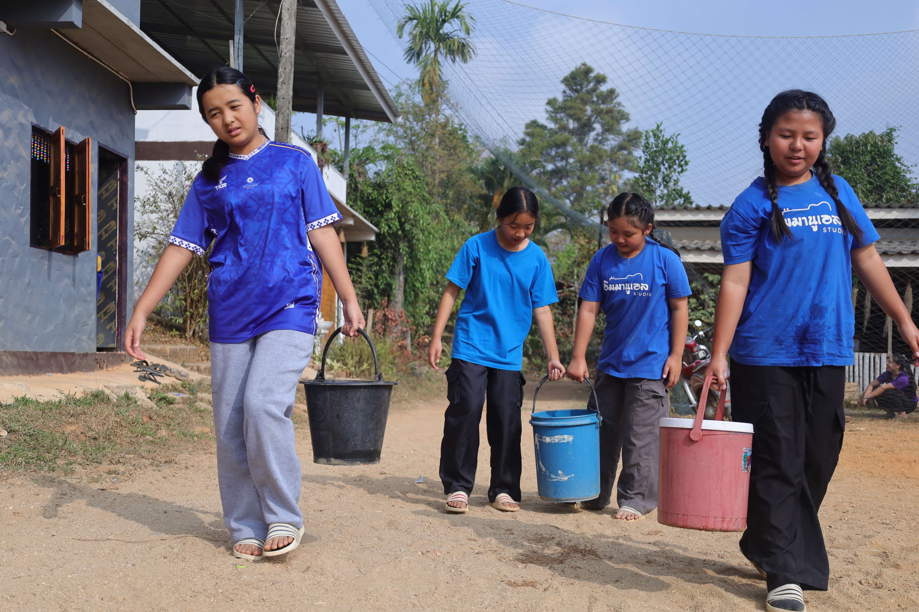 The children went to fetch water from the community well.