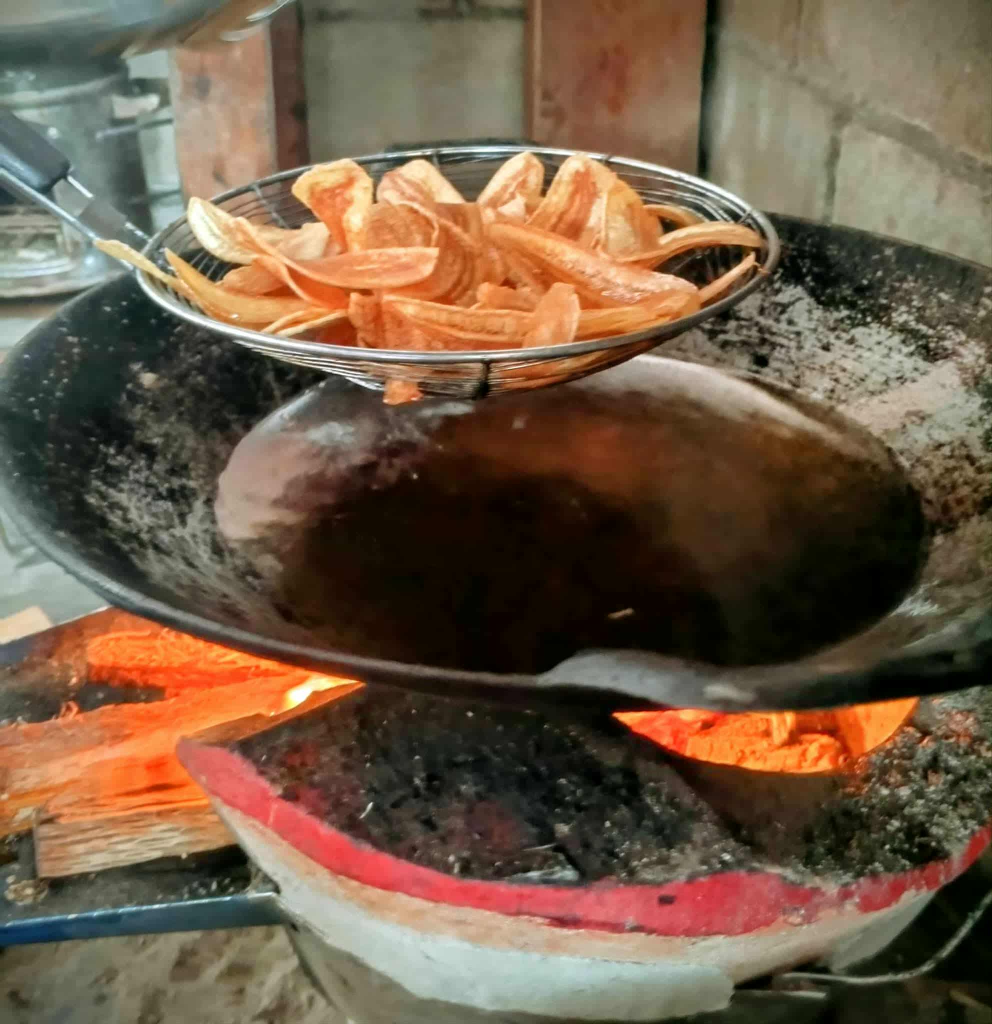 Fry the banana chips until golden brown and crispy, then set aside.