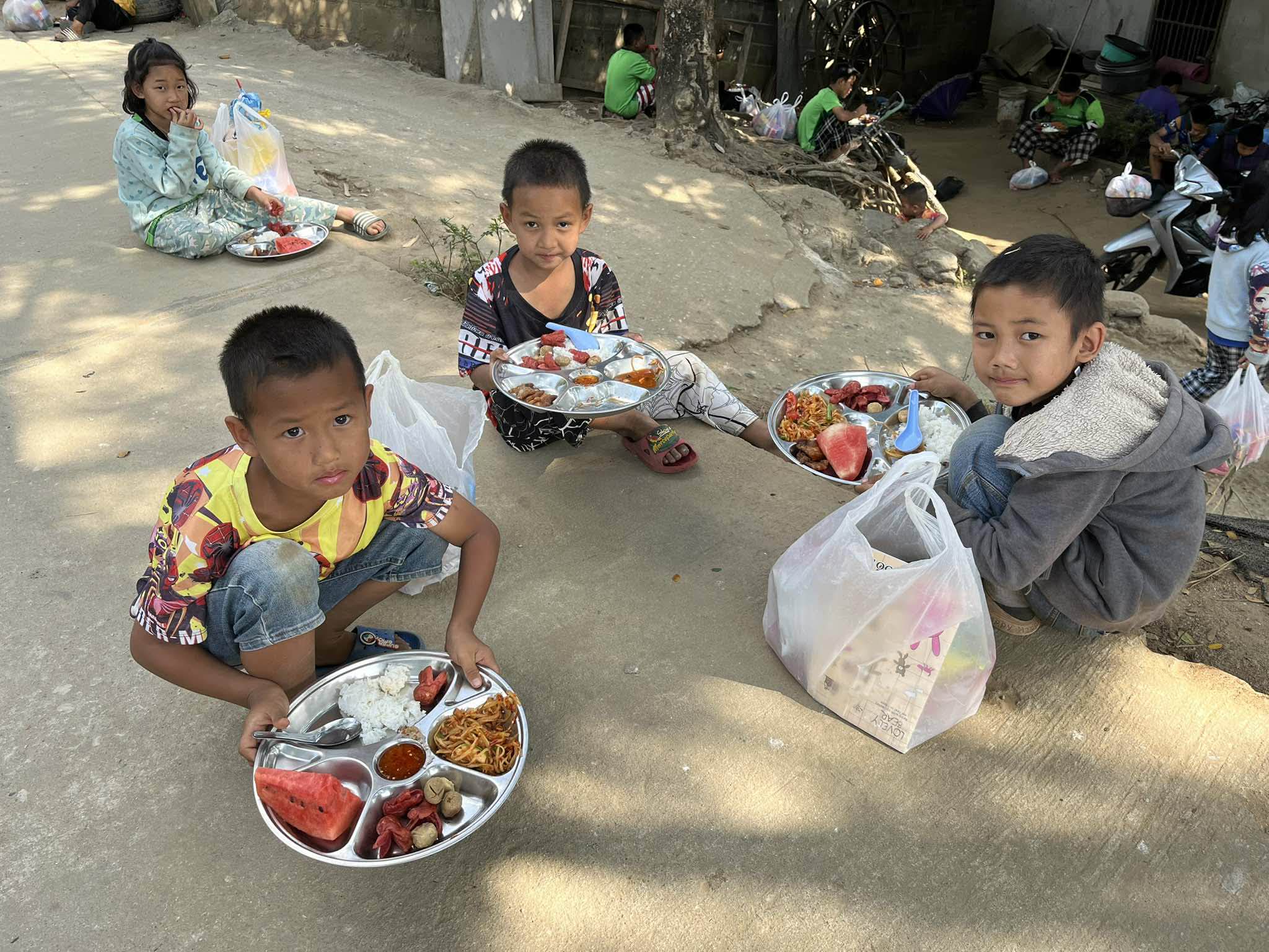 The children ate at a street stall.