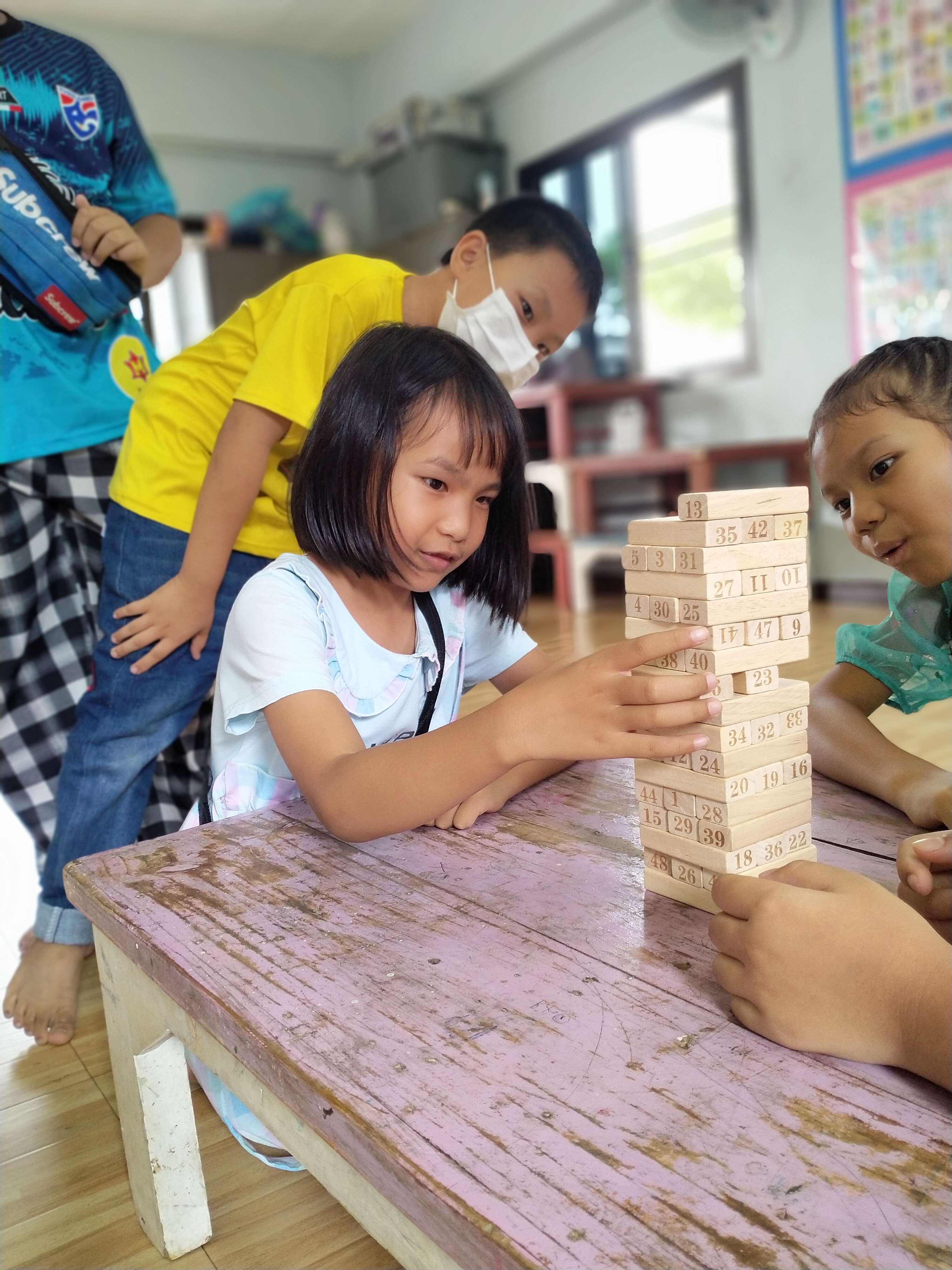Children enjoy playing with developmental toys.