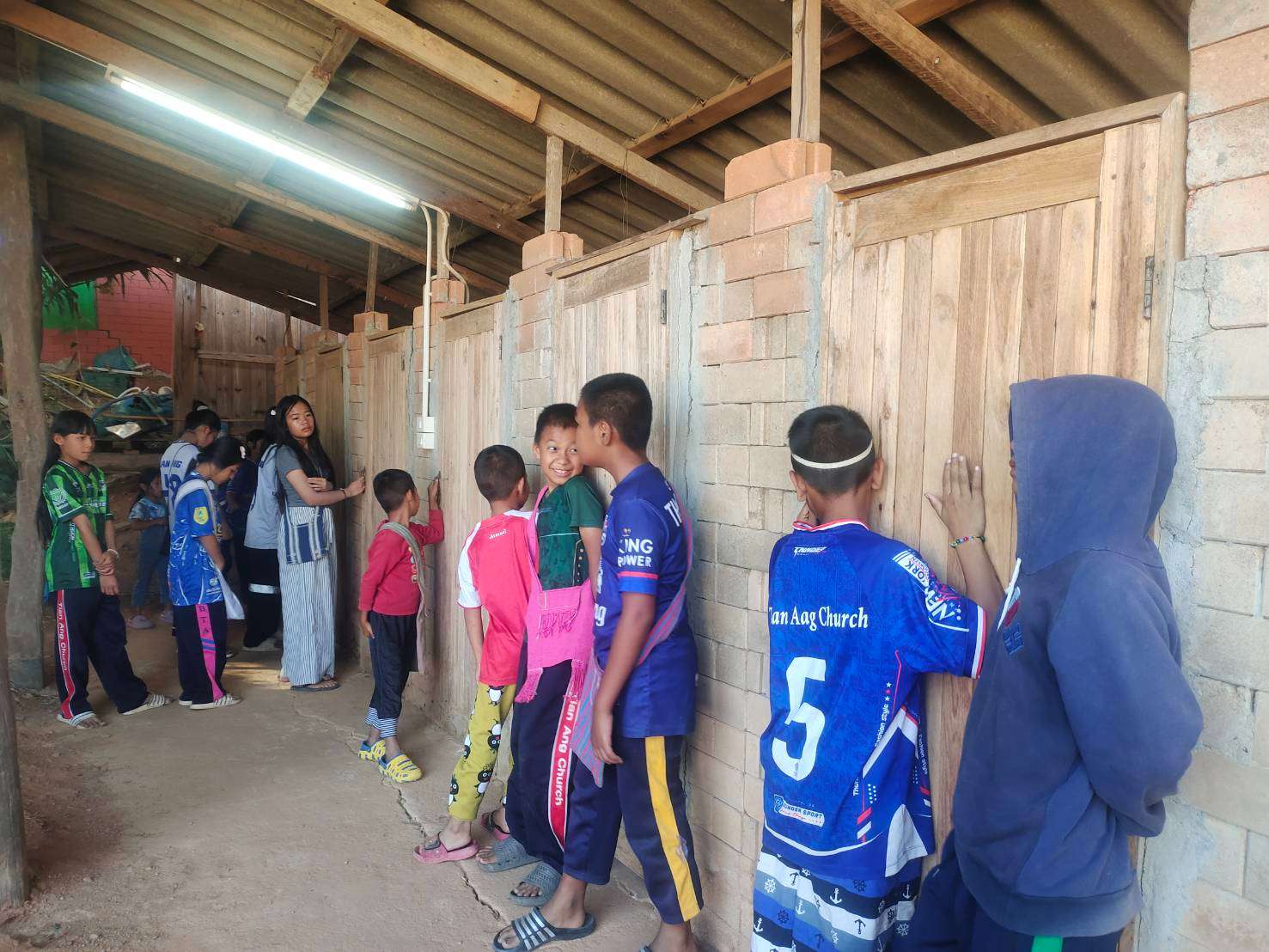 Children had to wait in line to use the restroom.