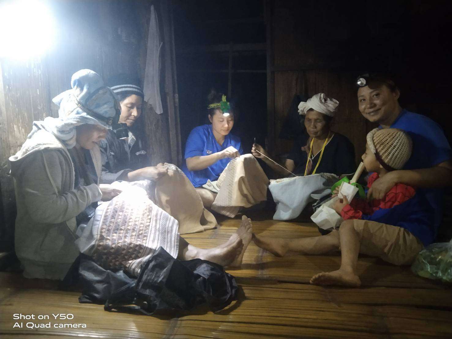 Children and parents need light to embroider.