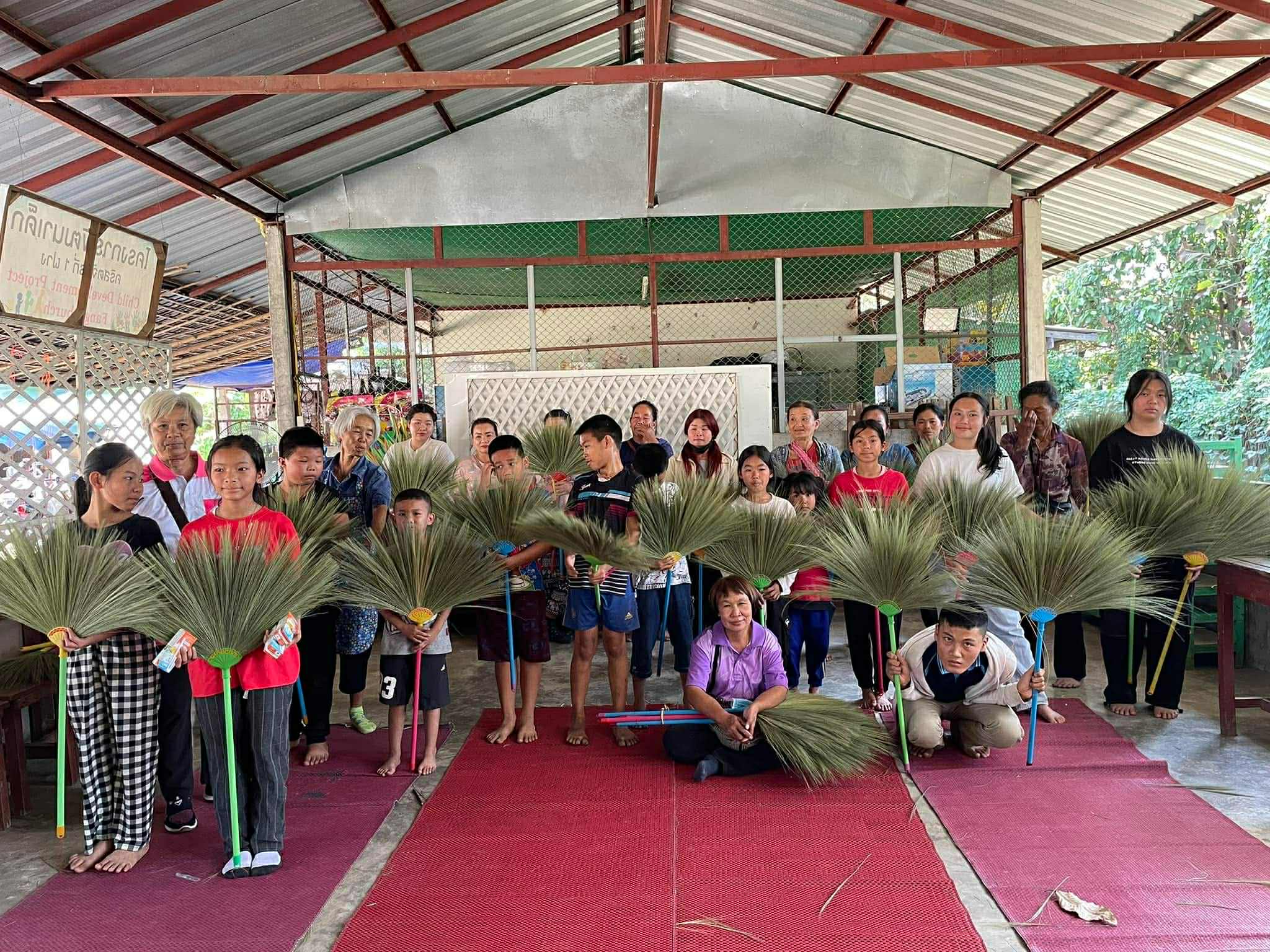 Crafted with Care: The finished grass broom stands as a testament to hard work and creativity, ready to serve