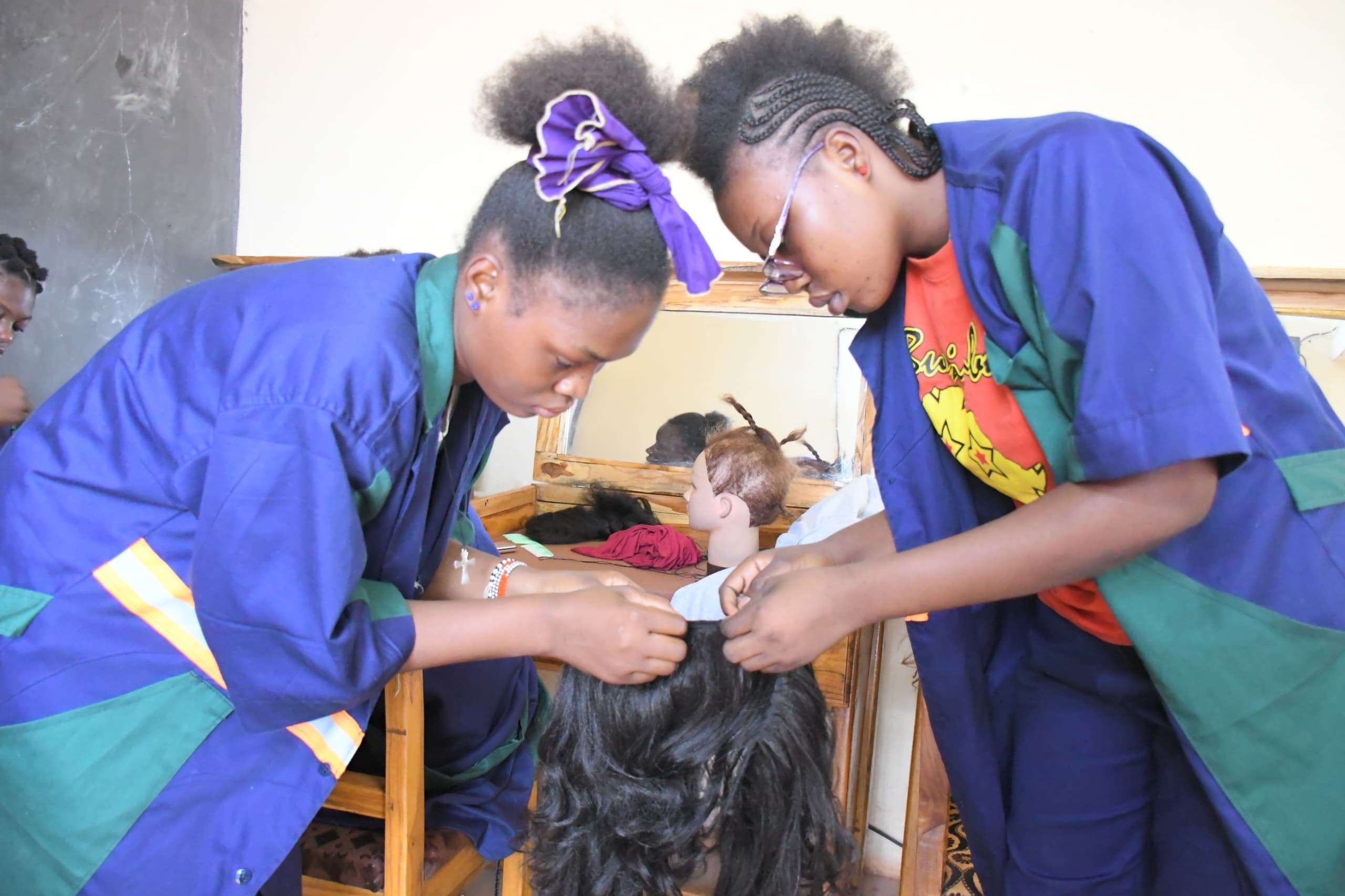 Beneficiary learning women's hairdressing