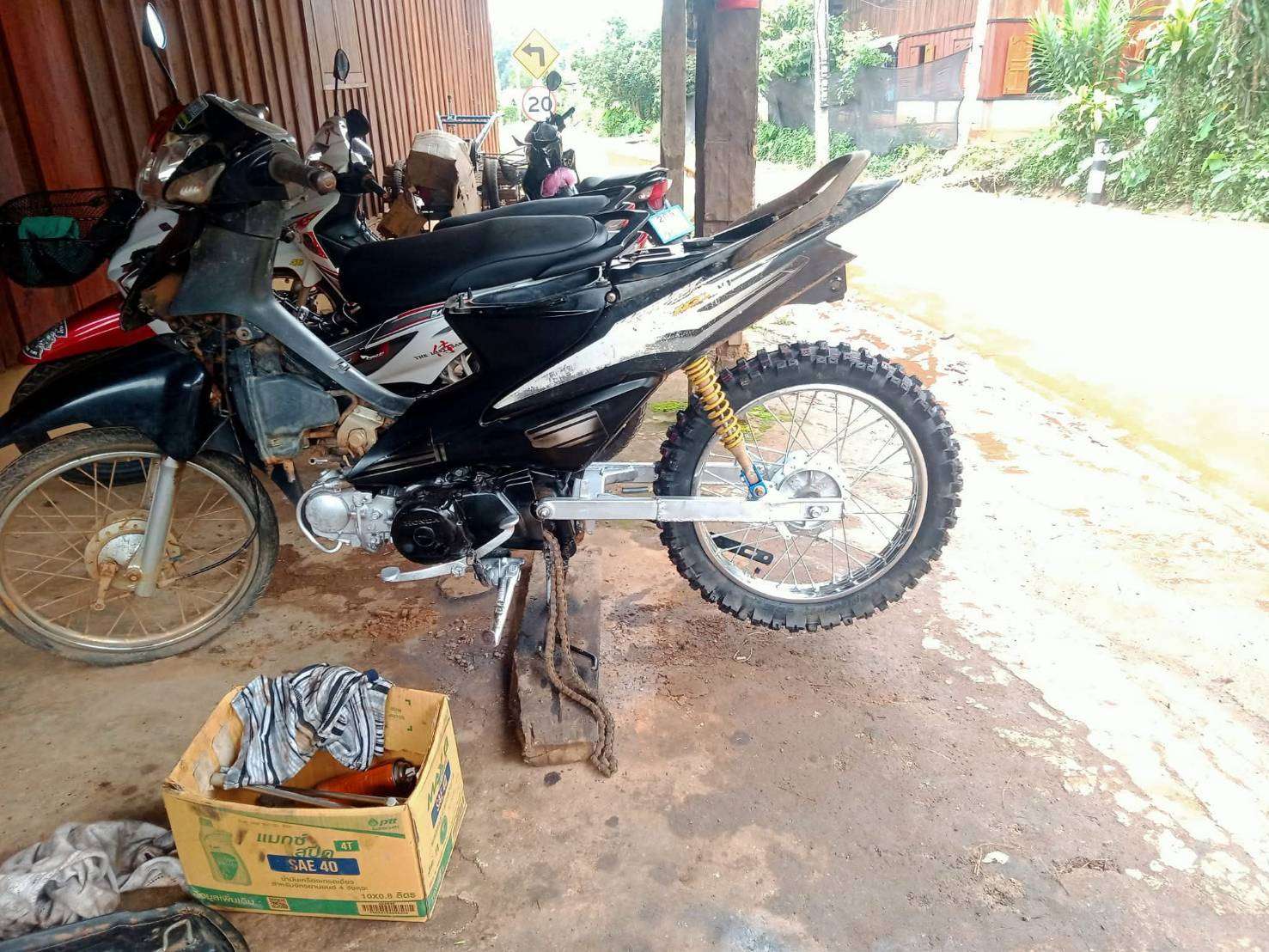Motorcycles belonging to people in the community that need repairing.