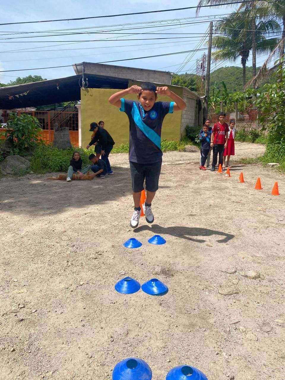 children performing routine exercises