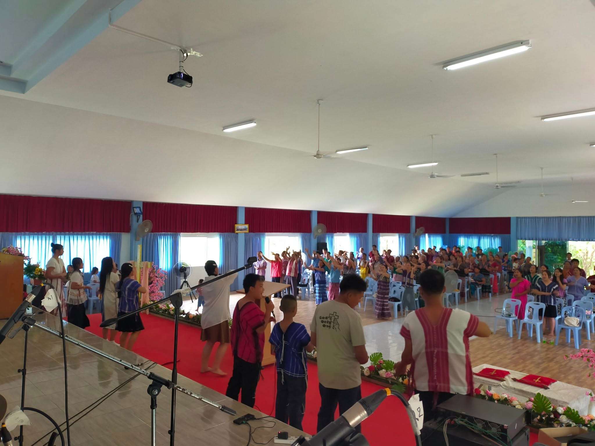 Leading worship in the church.
