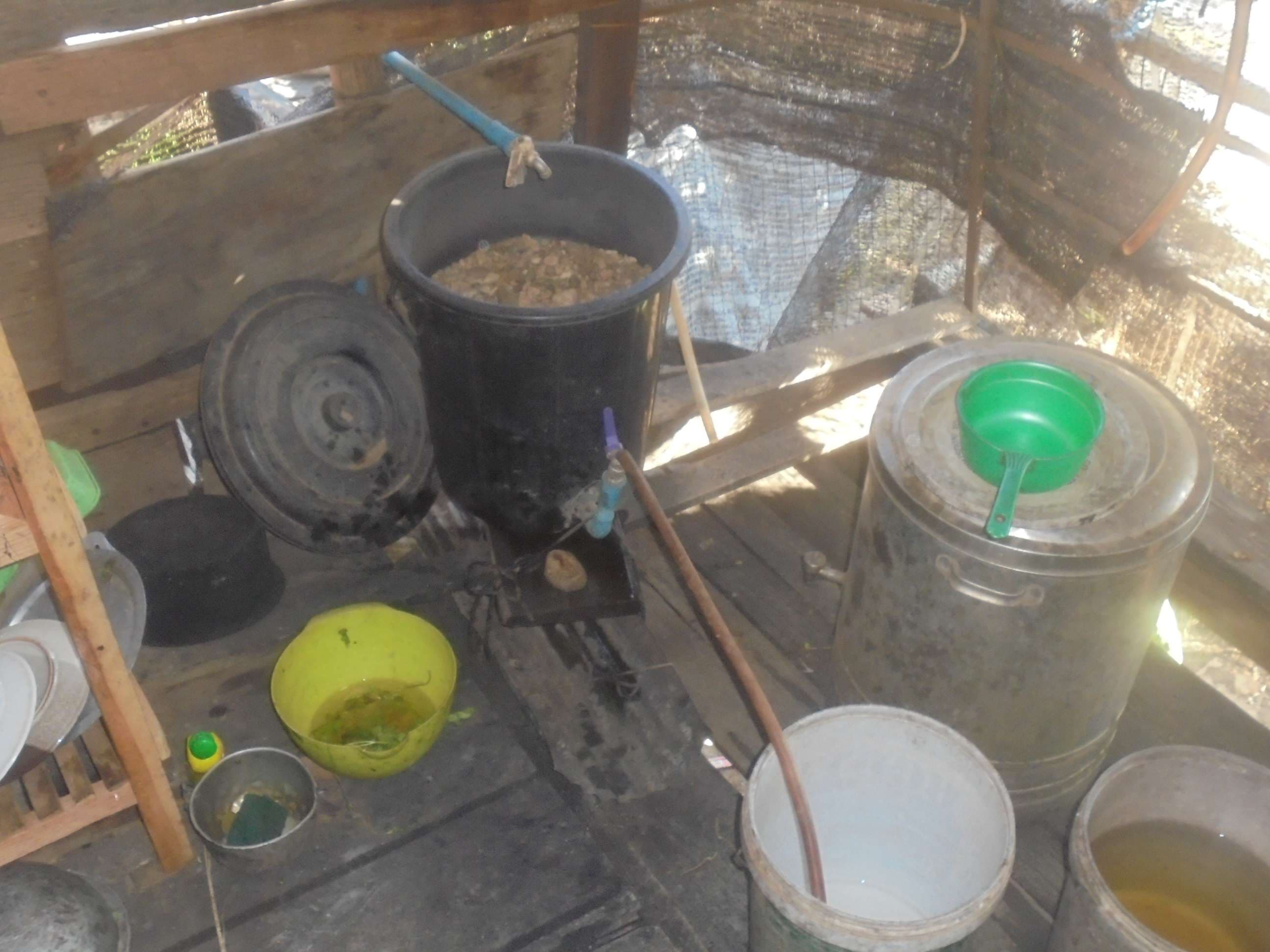 They used a simple container, carefully crafted to filter the water and keep it safe for later use.