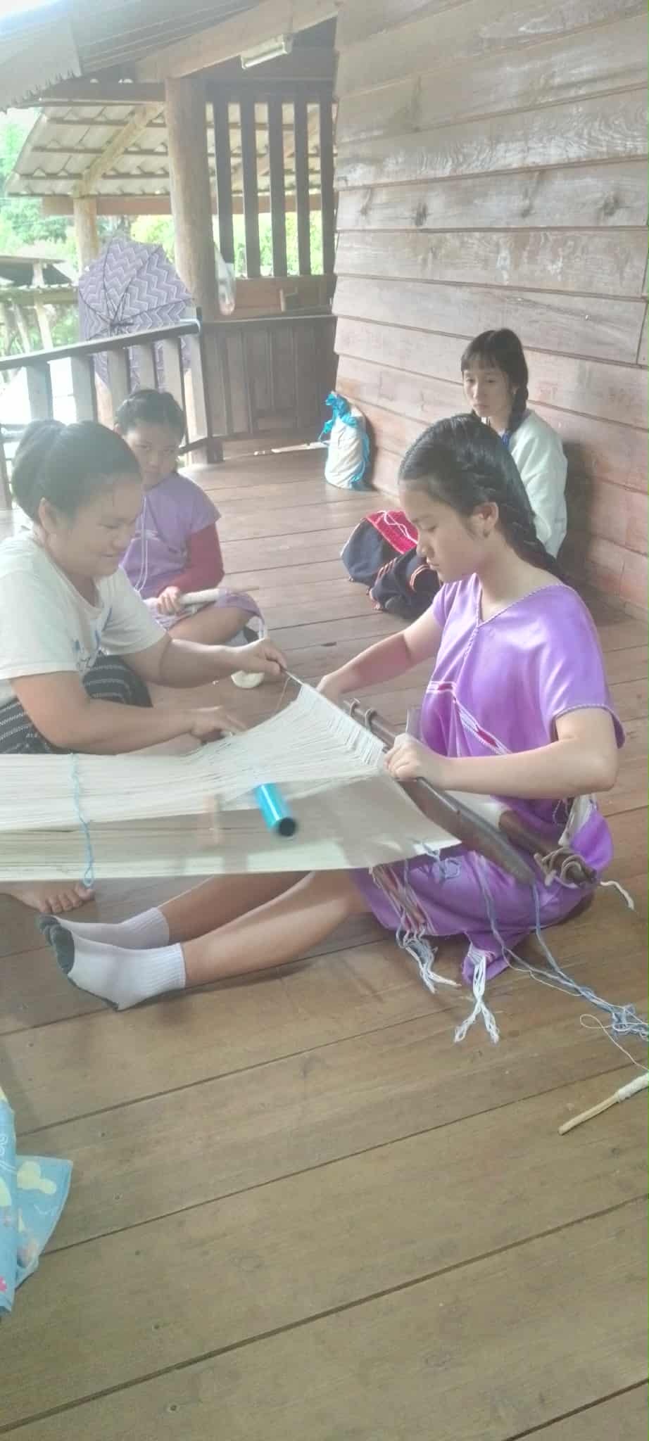 Weaving using local resources (waist loom)