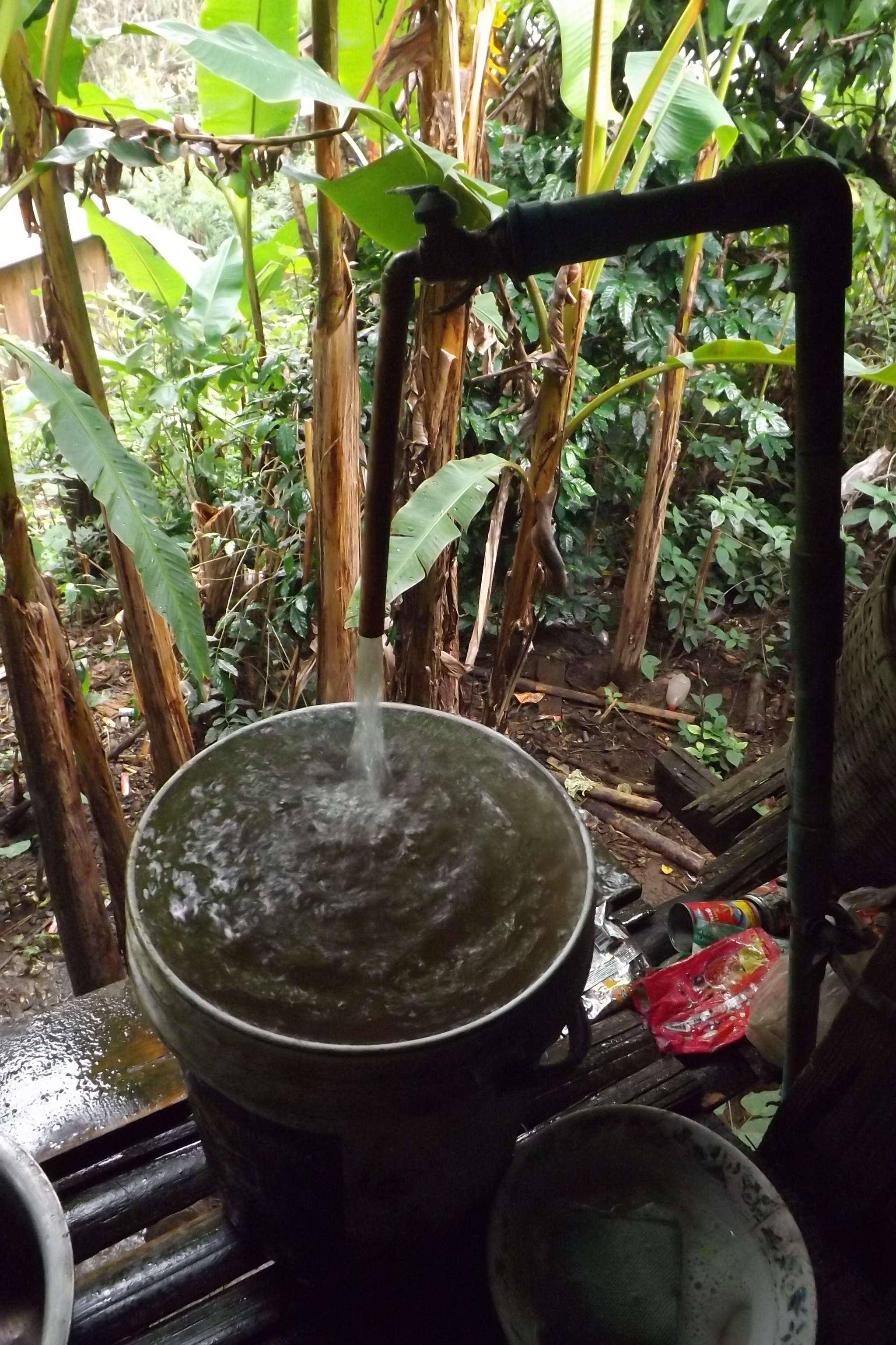 The water used by the children and the community is cloudy and contains sediment.