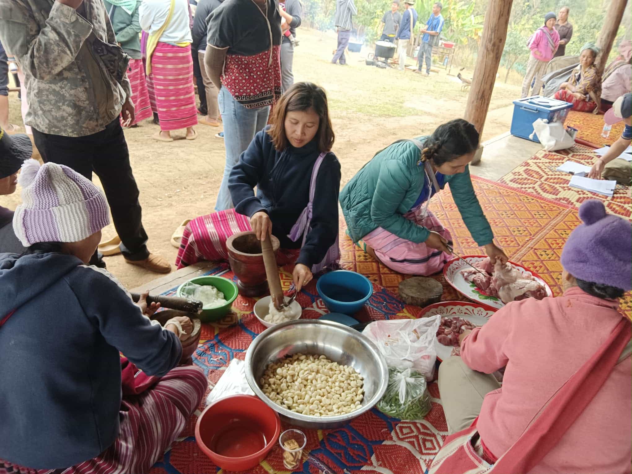 Preparing the ingredients needed to make fermented pork sausage (Naem Moo).