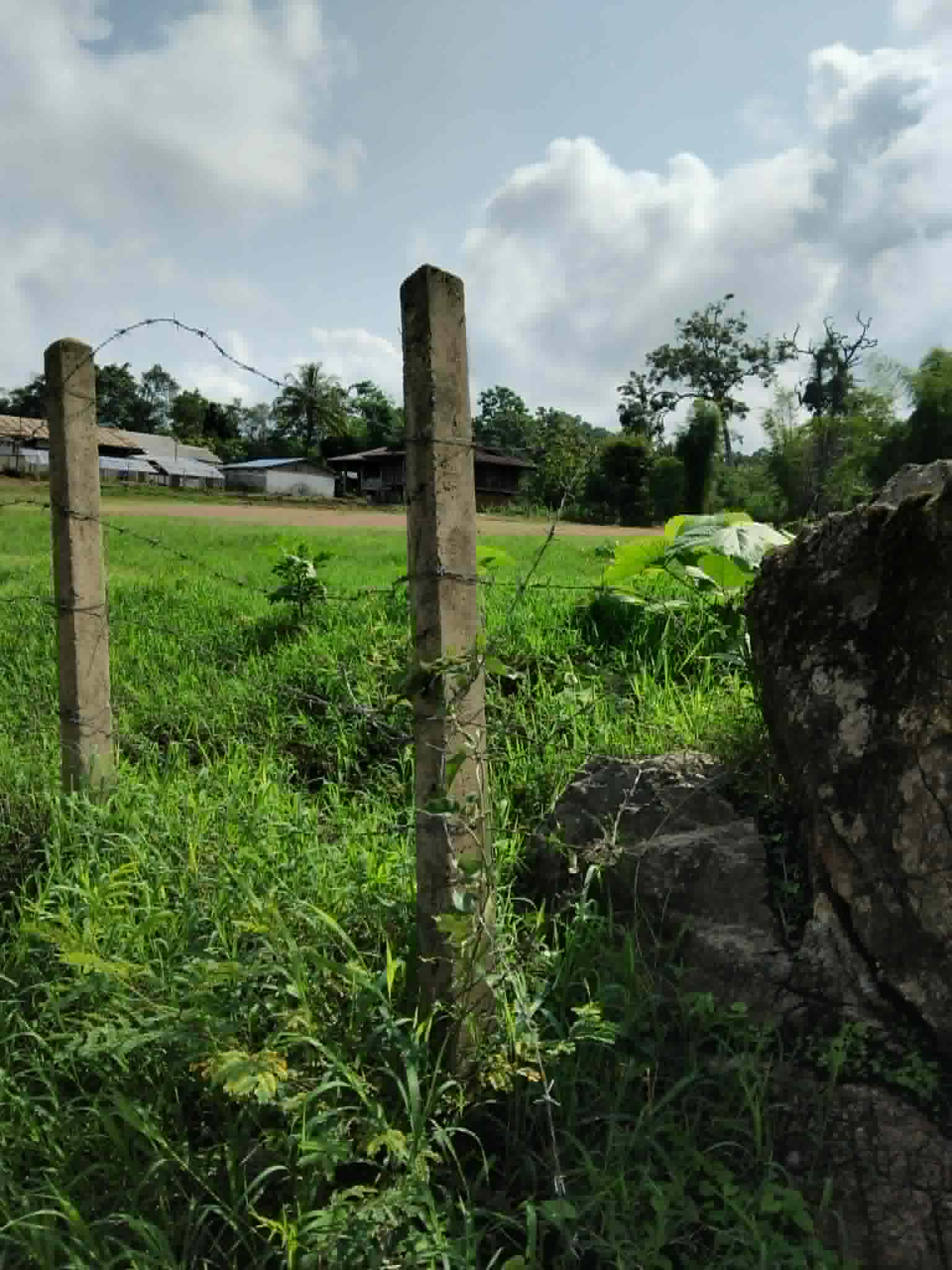 An image showing a poorly secured and loosely fenced area