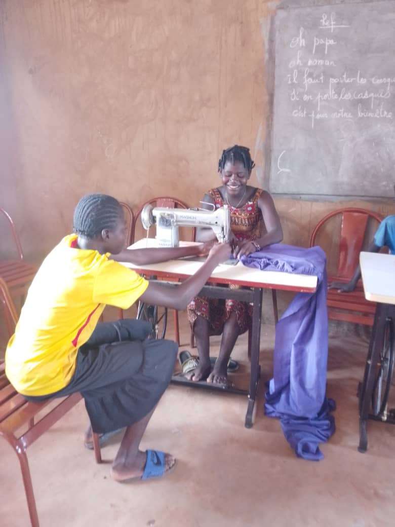 A young participant gaining practical experience through hands-on training.