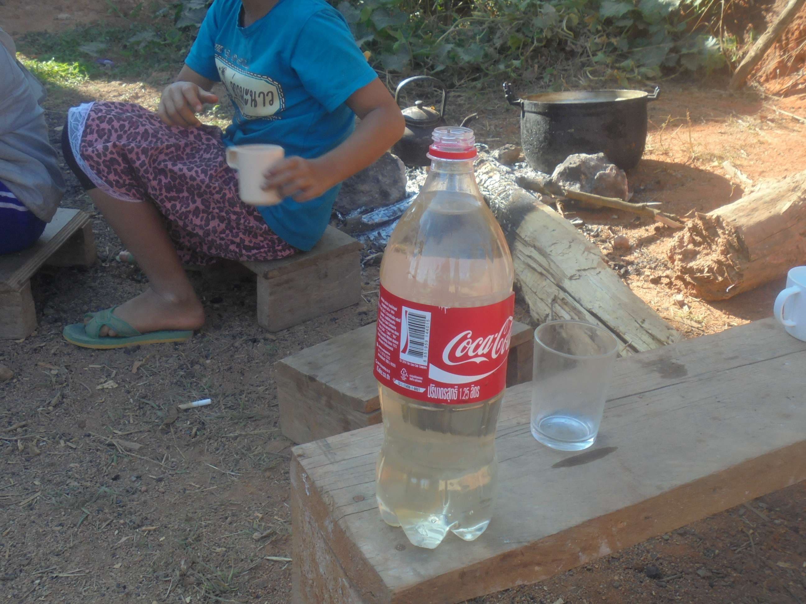 The boiled water is bottled for storage.