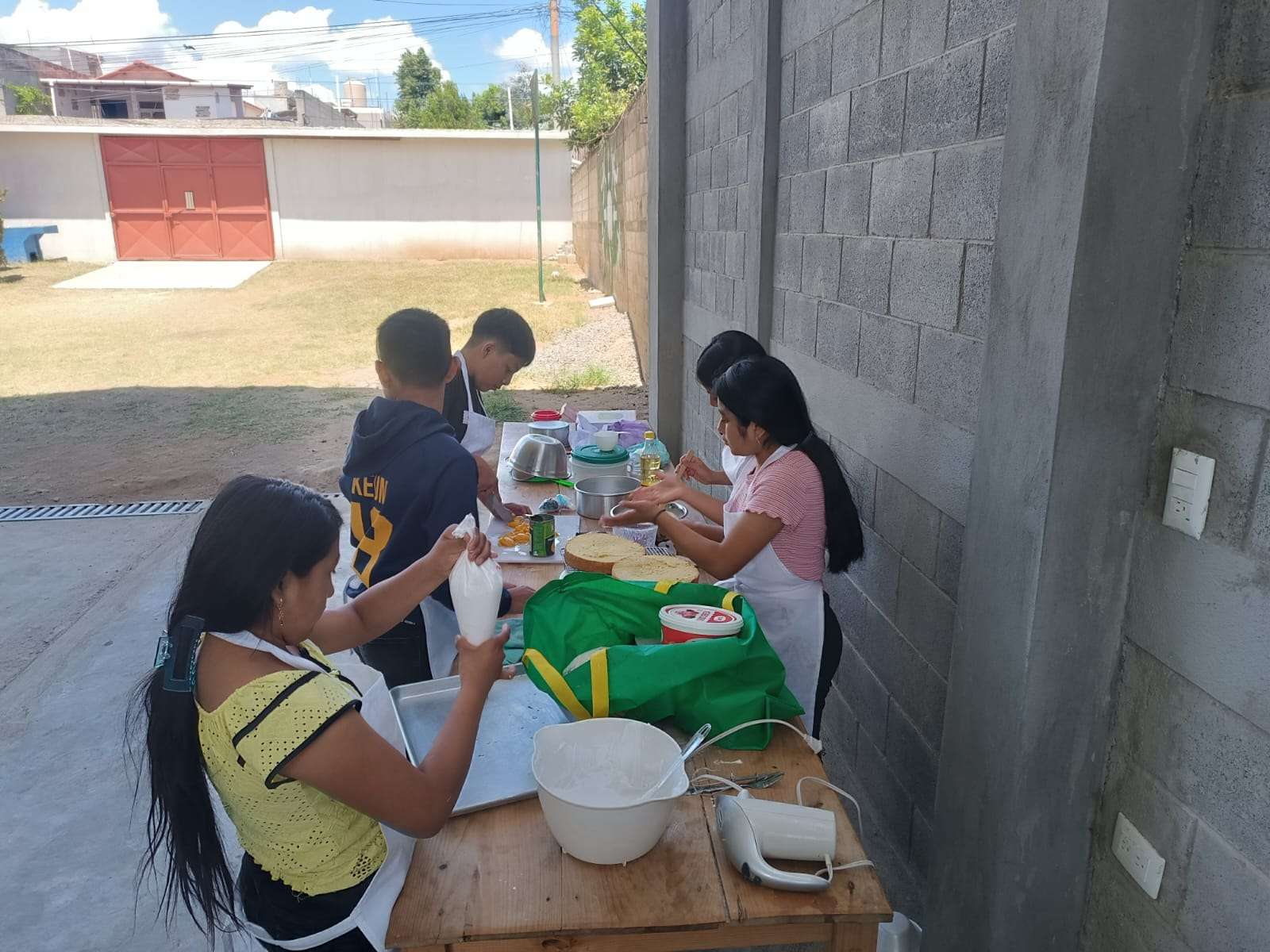 Participants cooking outdoors