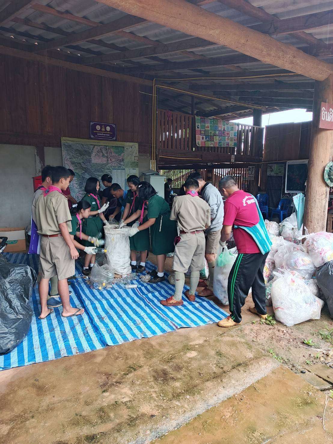 Children and youth are joining together to separate the waste.