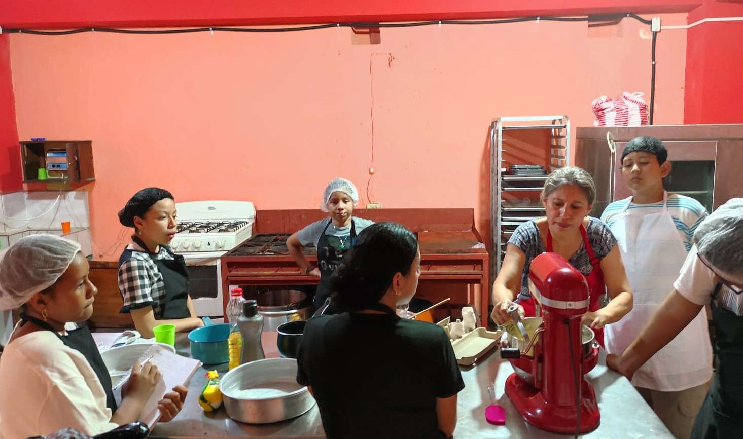 Group of young people training in pastry making