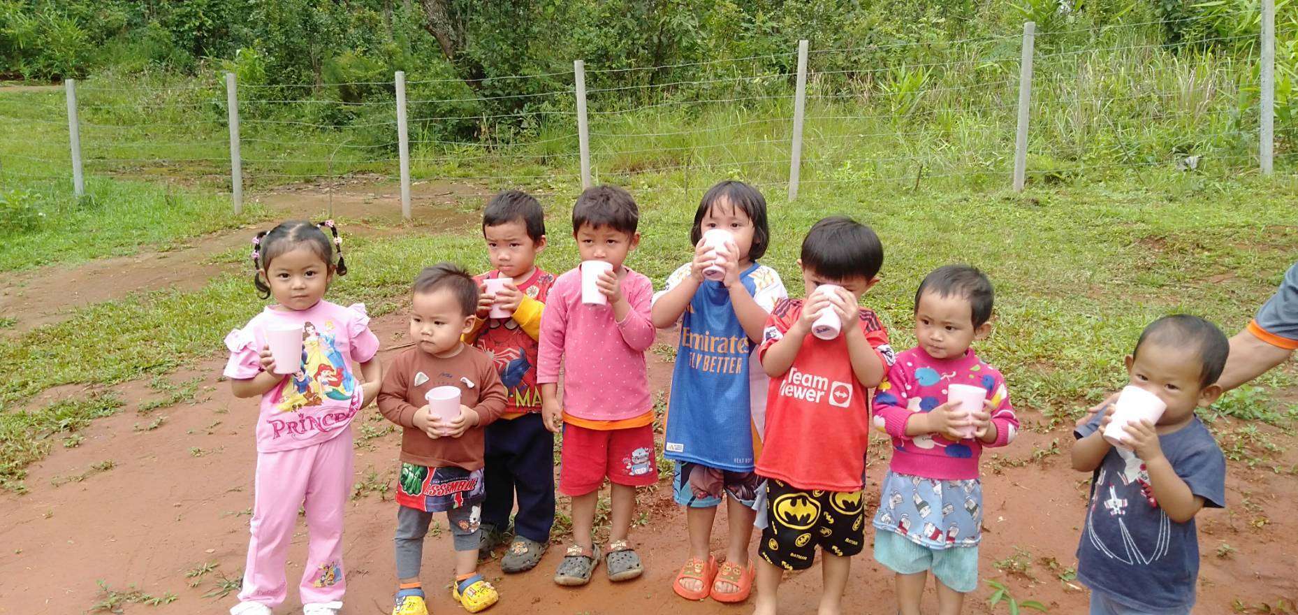 Children drink water from unclean wells.