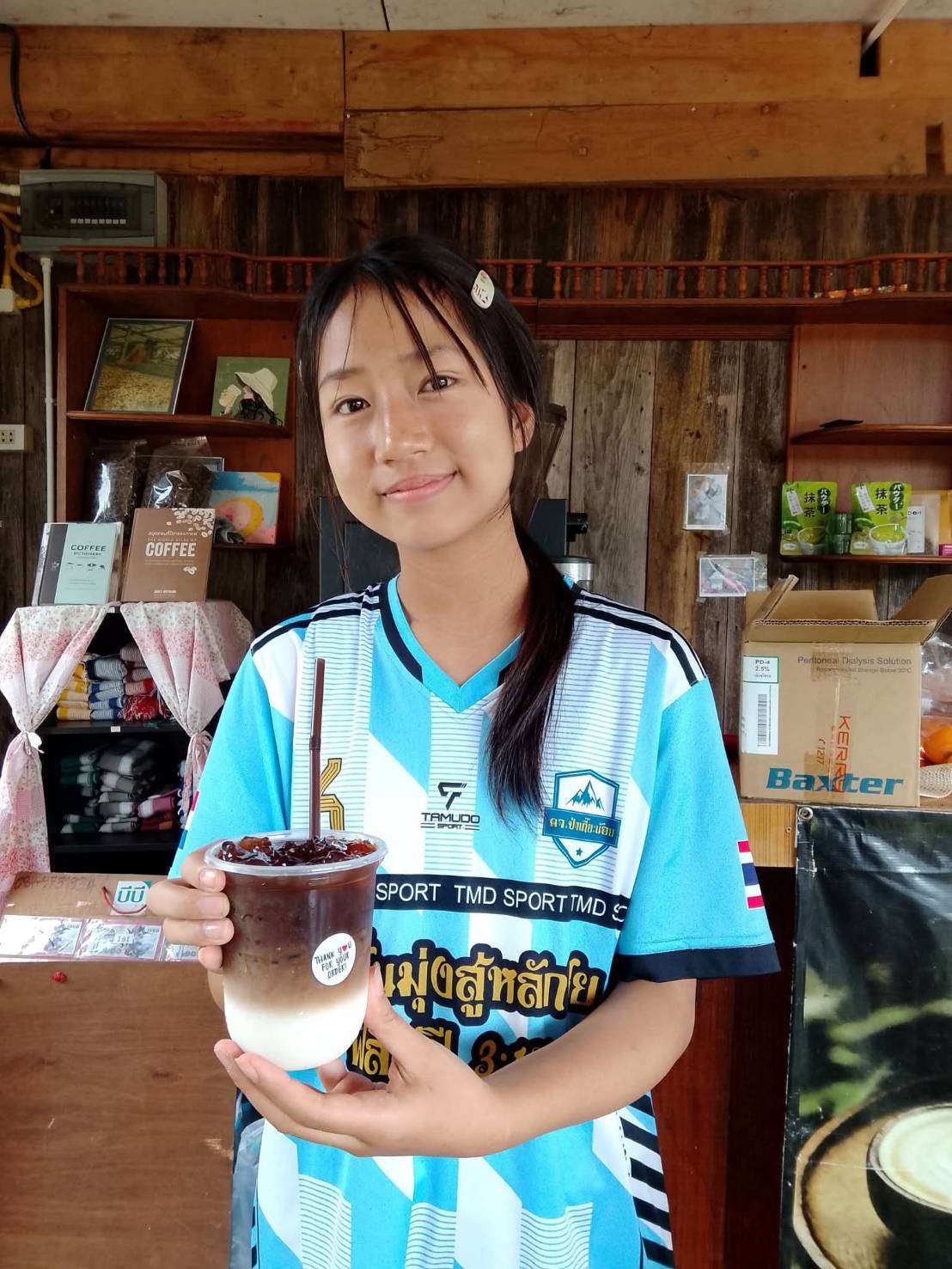 Children are trained to make coffee and sell it at an youth coffee shop.