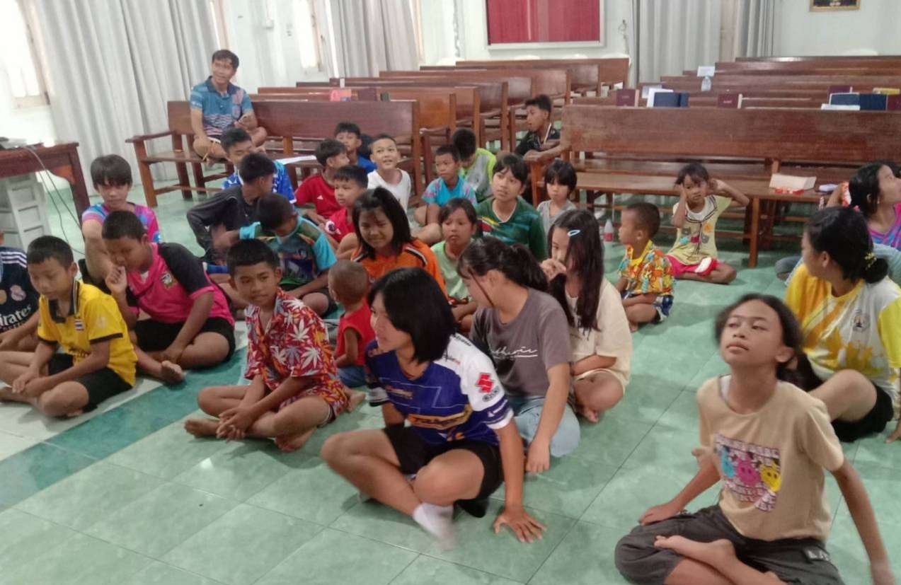The children are learning stories from the Bible.