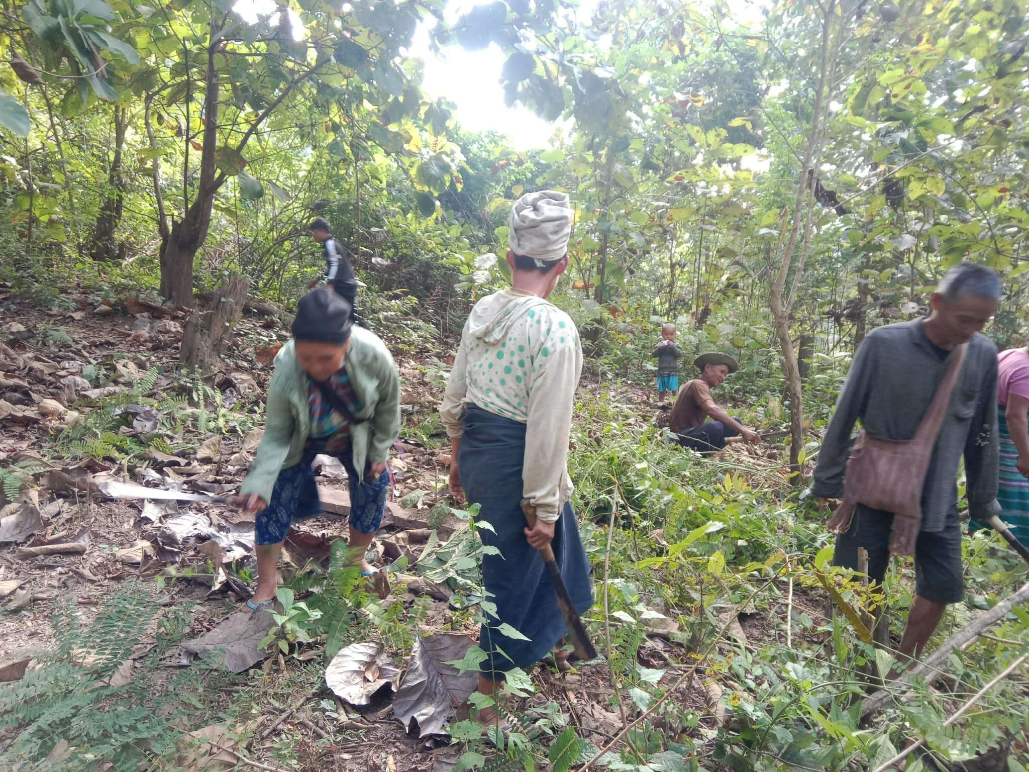 The parents of the children came to help clean the school site.