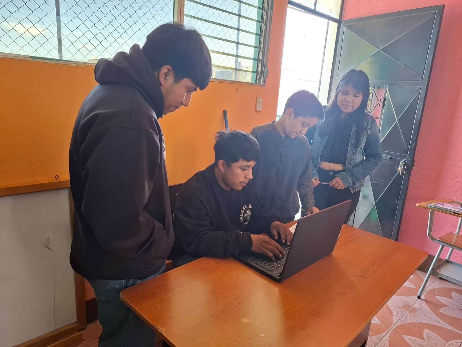 Participants taking turns performing their tasks