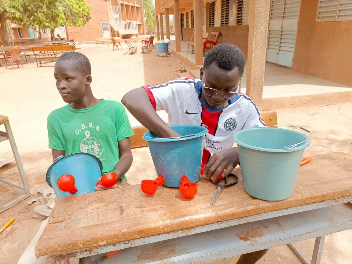 The young people trained make the drinking troughs