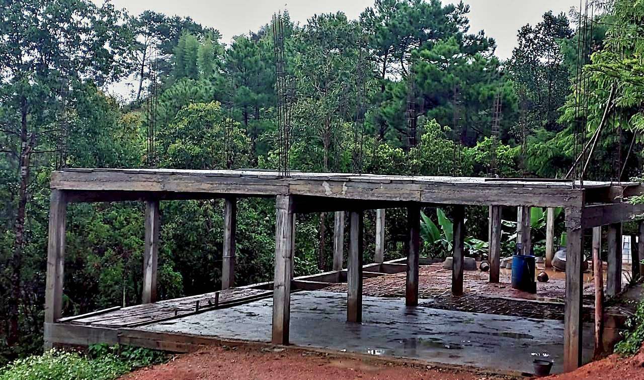 The existing building structure that will be expanded and renovated into a vocational skills training center.