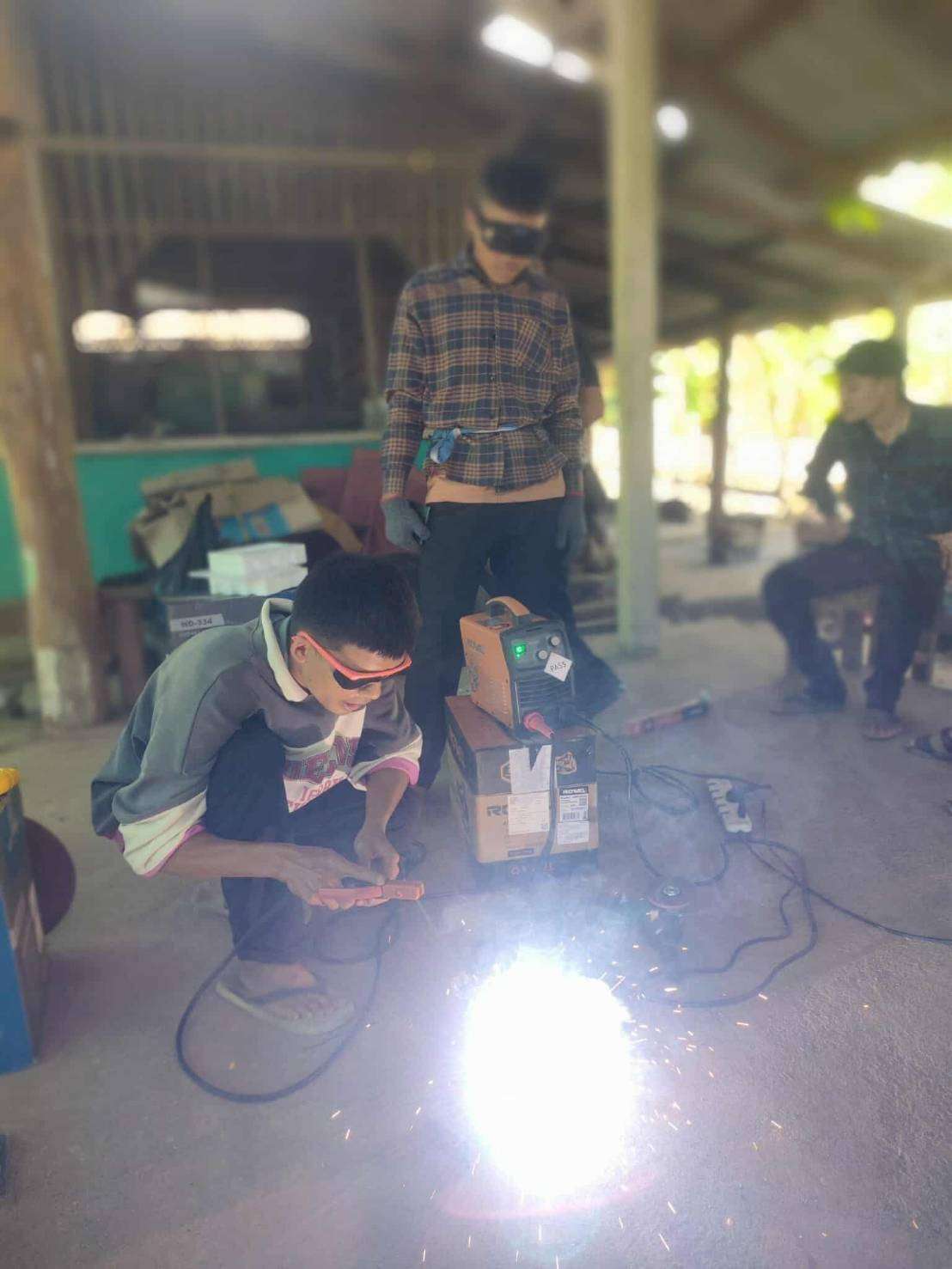 Taking action: Working together to implement the project with the local school.